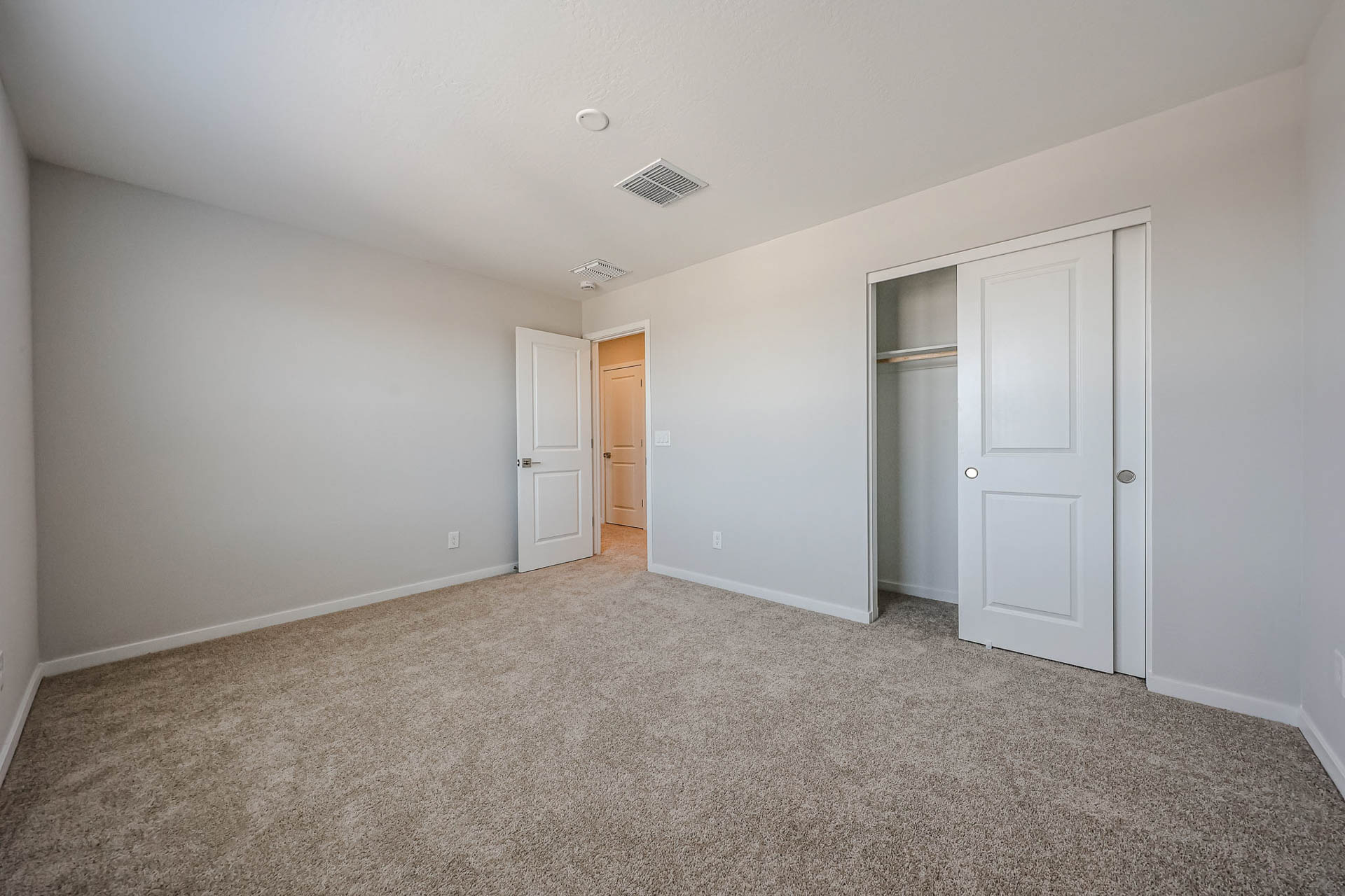 A room with white doors.