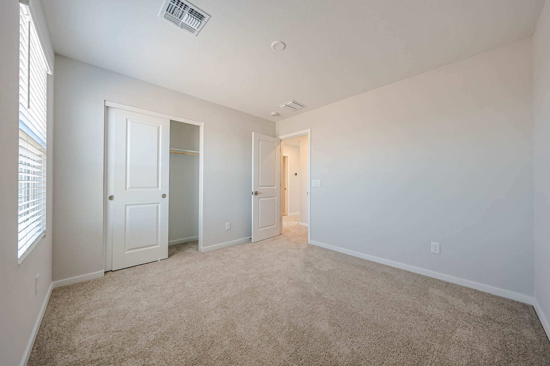 A room with white doors.
