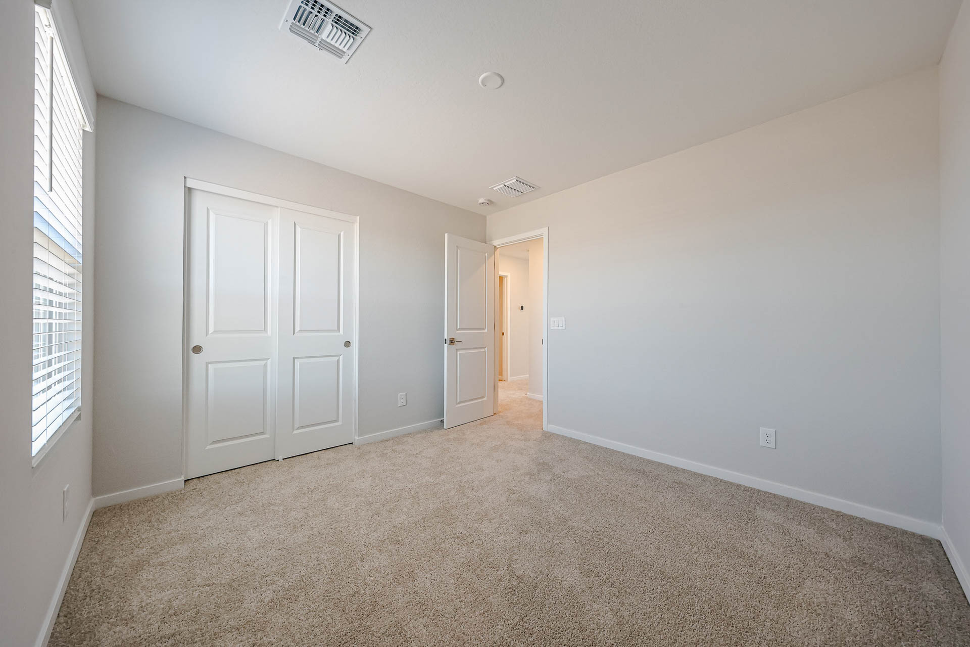 A room with white doors.