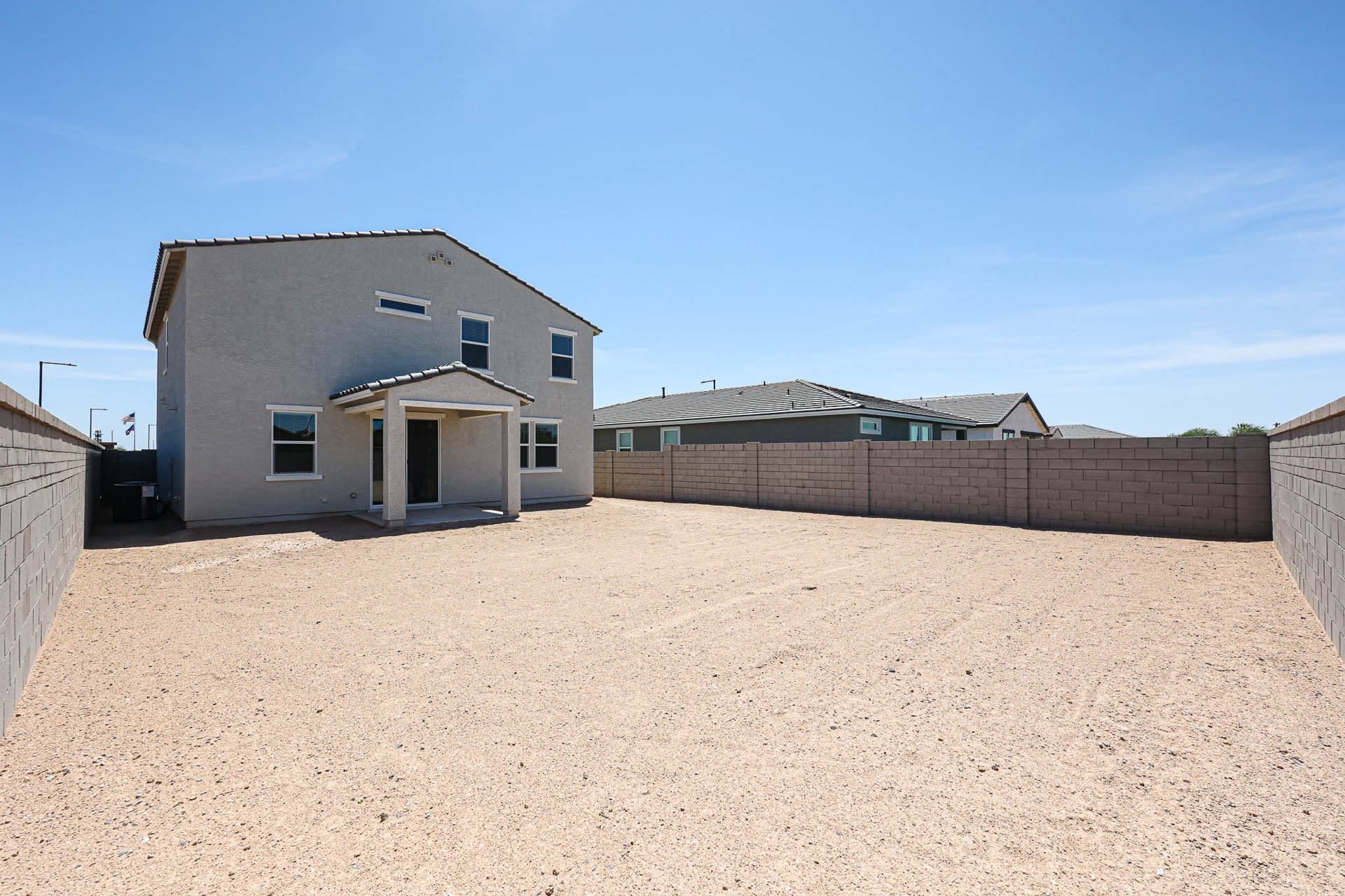 A building in a sandy area.