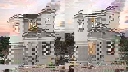 A white house with a garage.