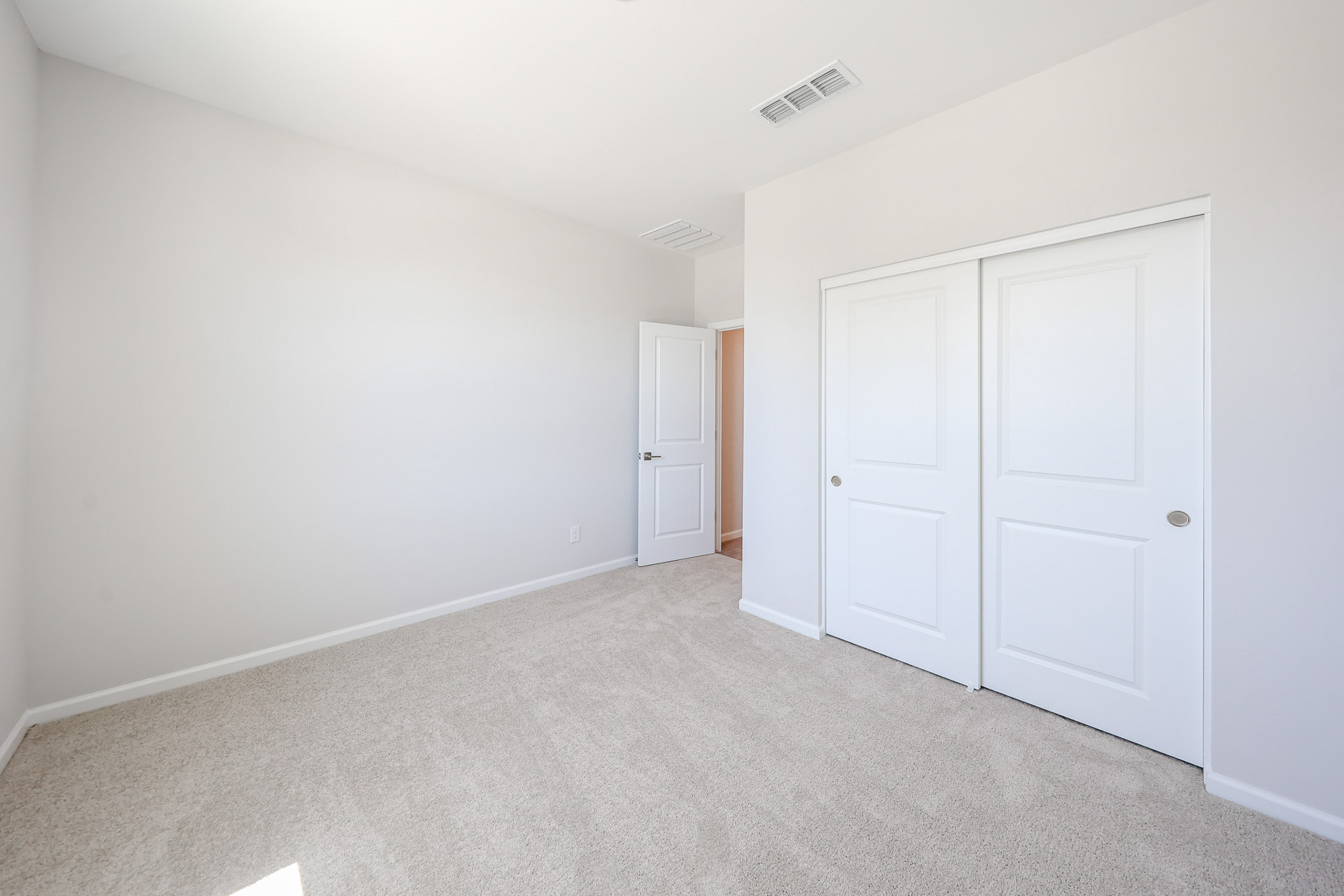 A room with white doors.