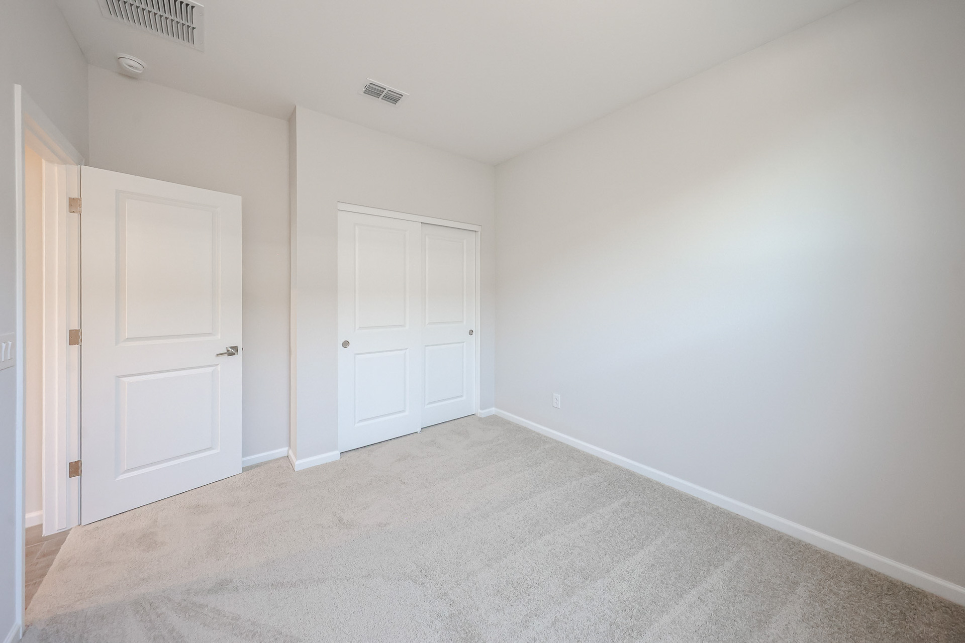 A room with white doors.