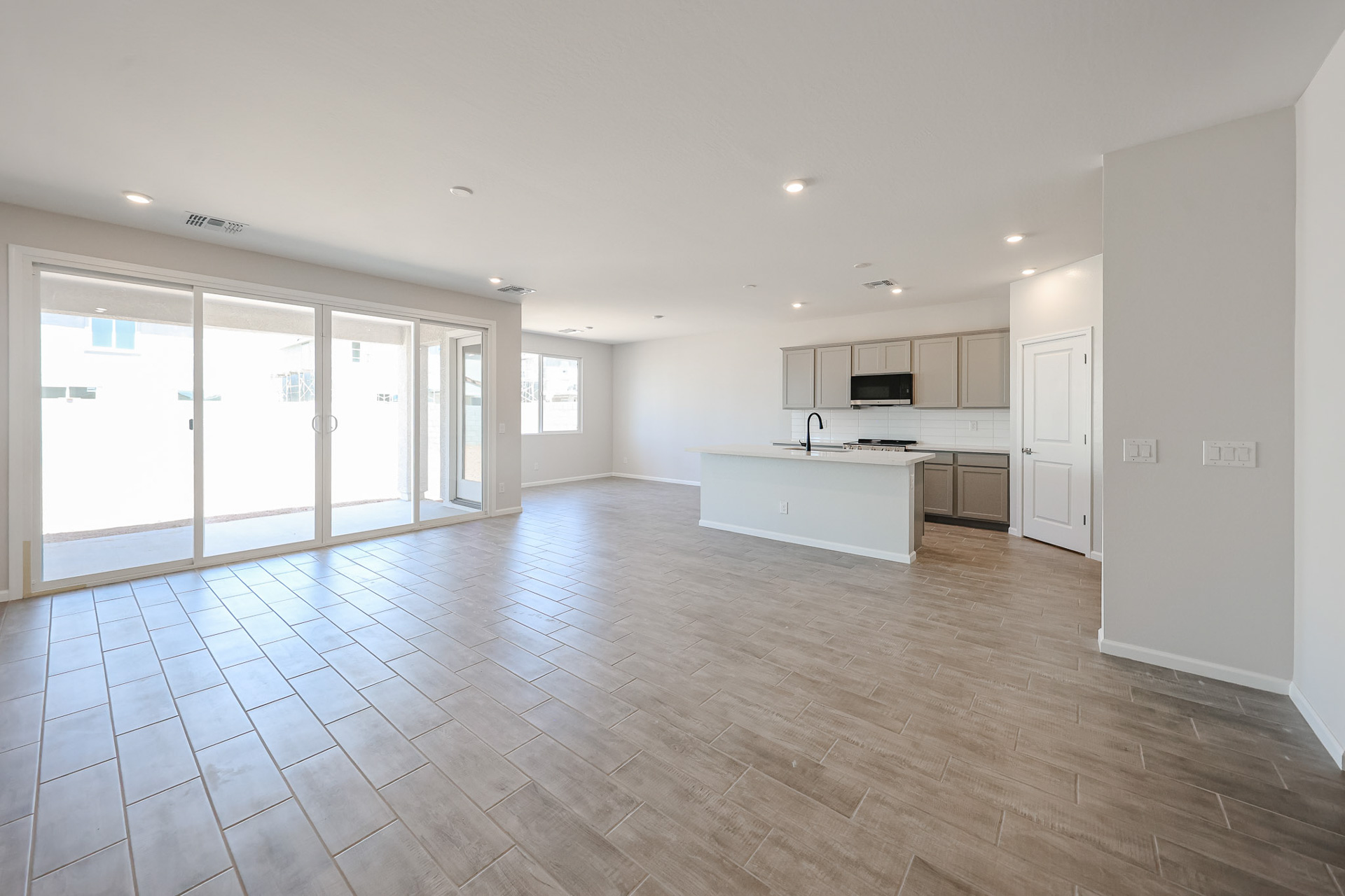 A large empty room with white walls.