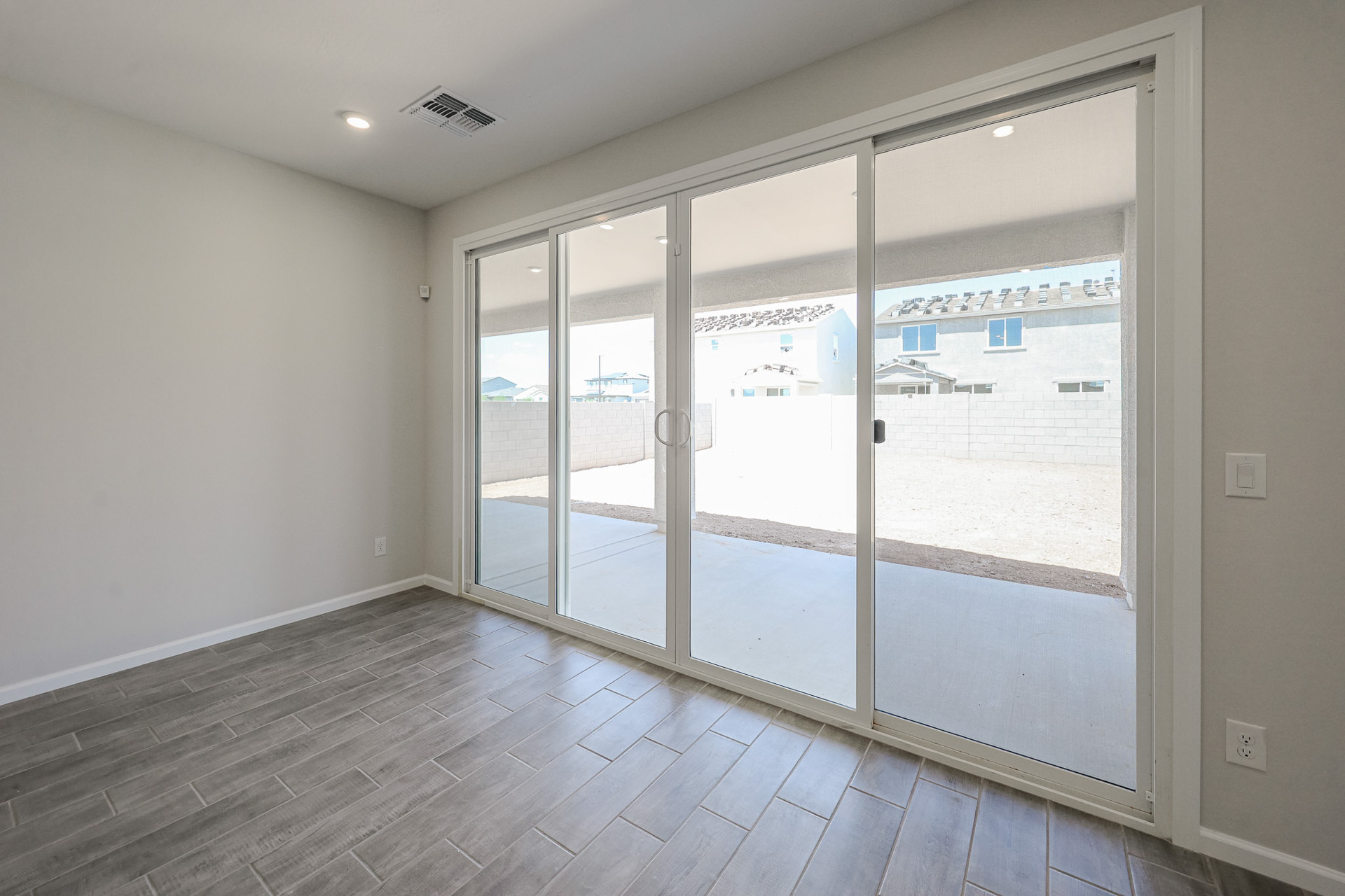 A room with a glass door.