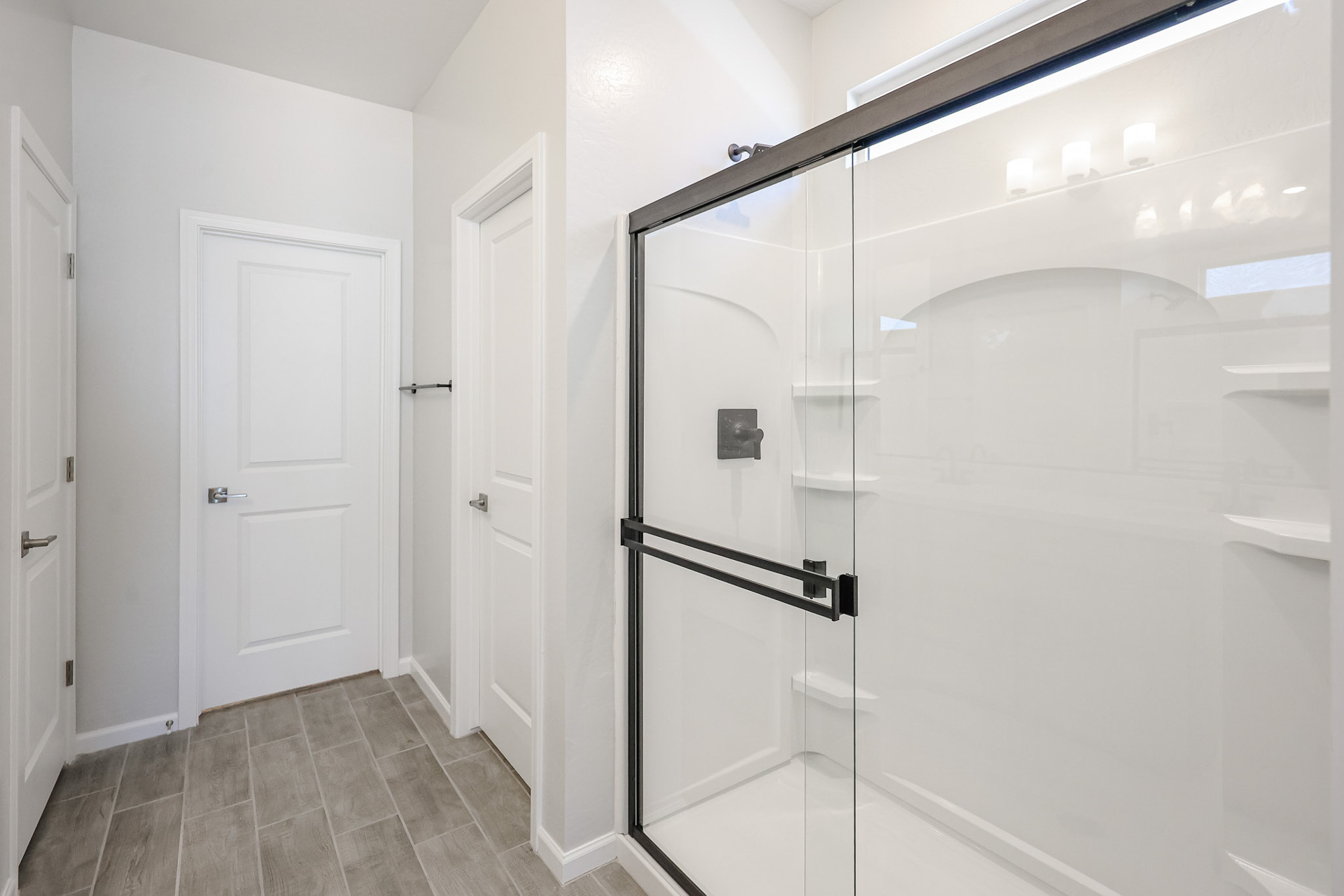 A room with white doors.