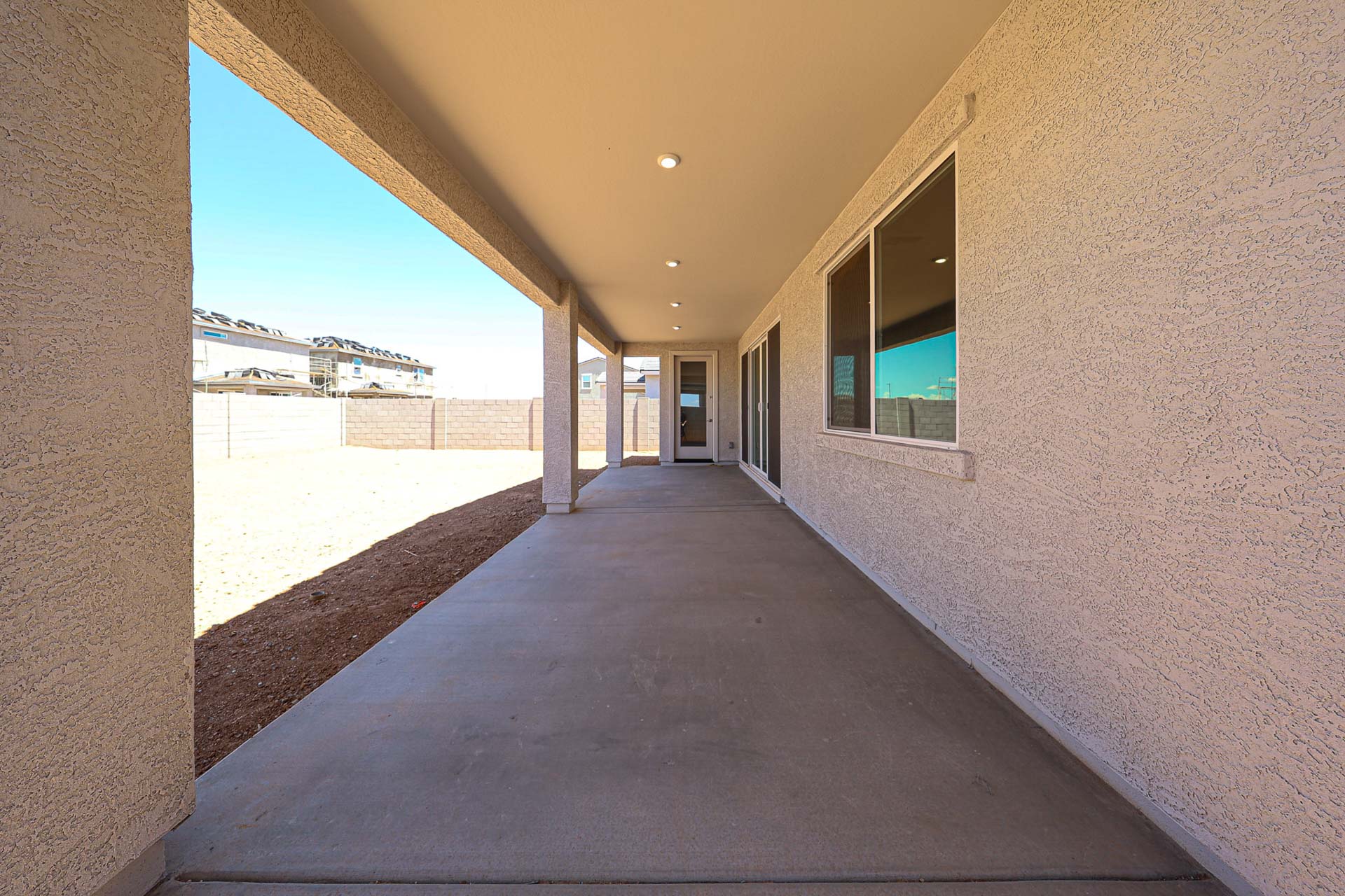 A long hallway with windows.