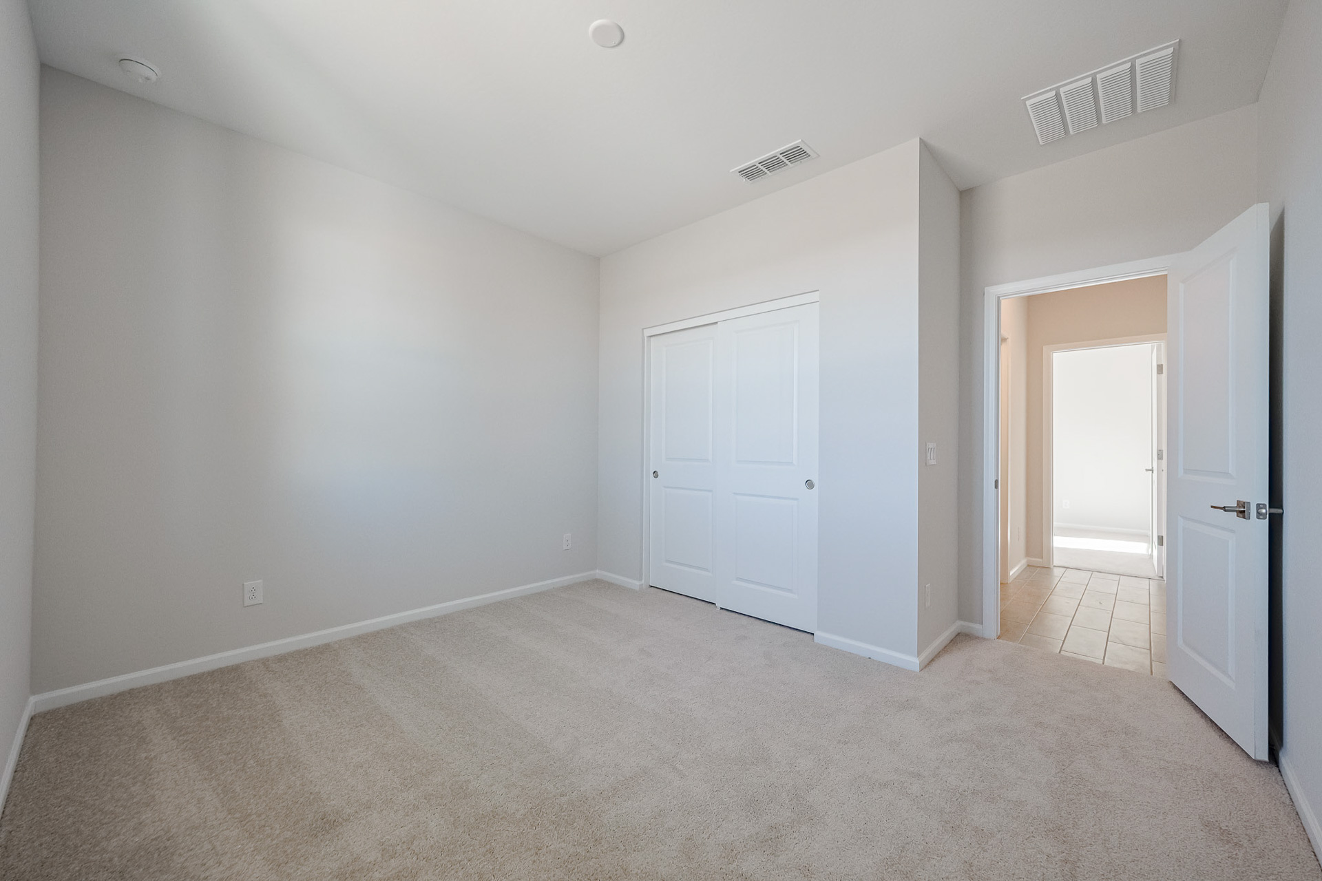 A room with white doors.