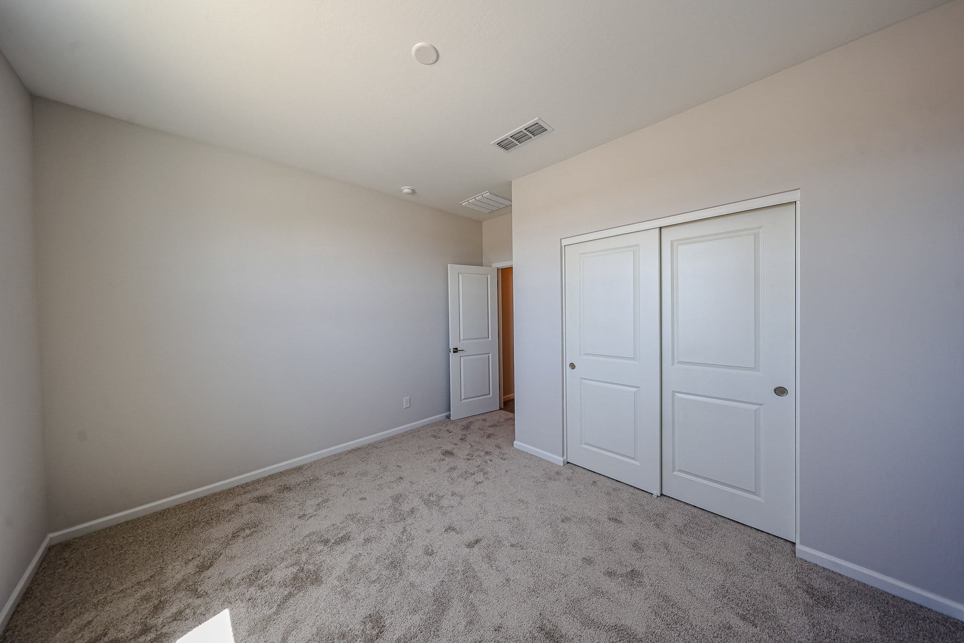 A room with white doors.