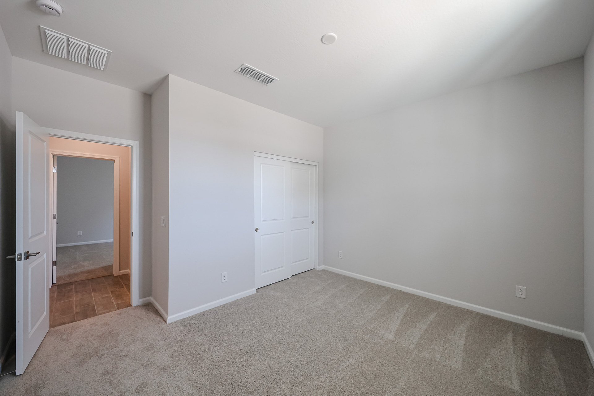 A room with white doors.