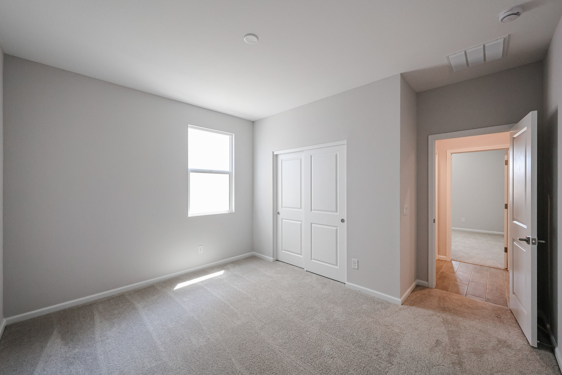 A room with white doors.