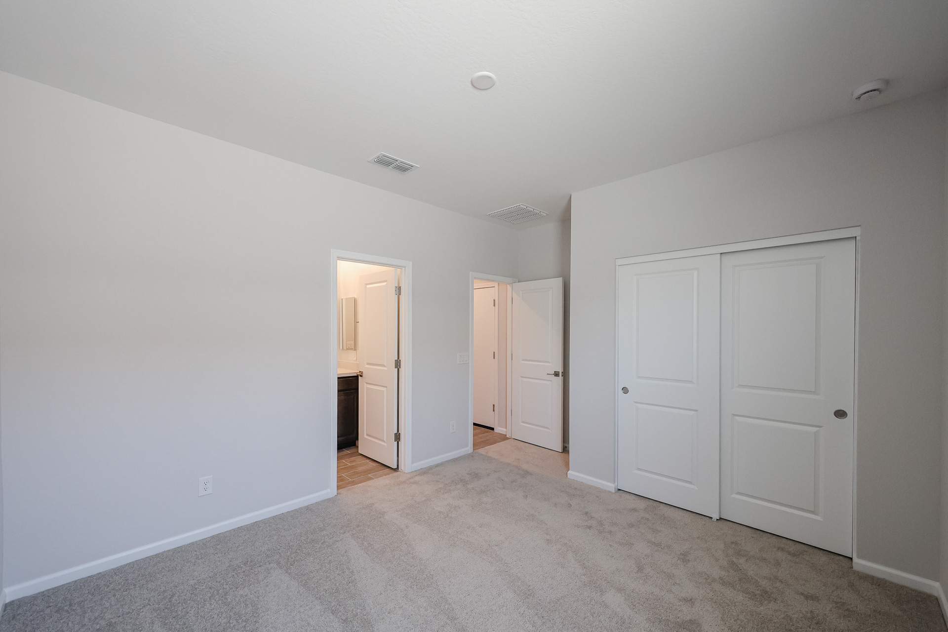 A room with white doors.
