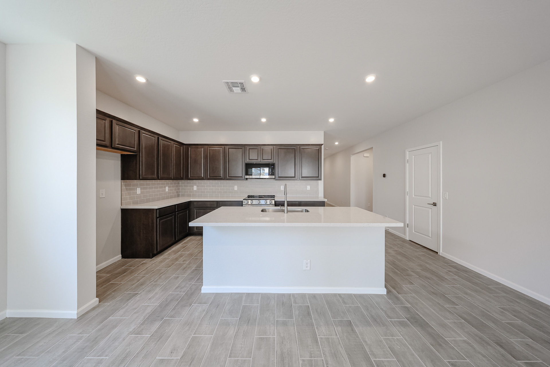 A kitchen with a large island.