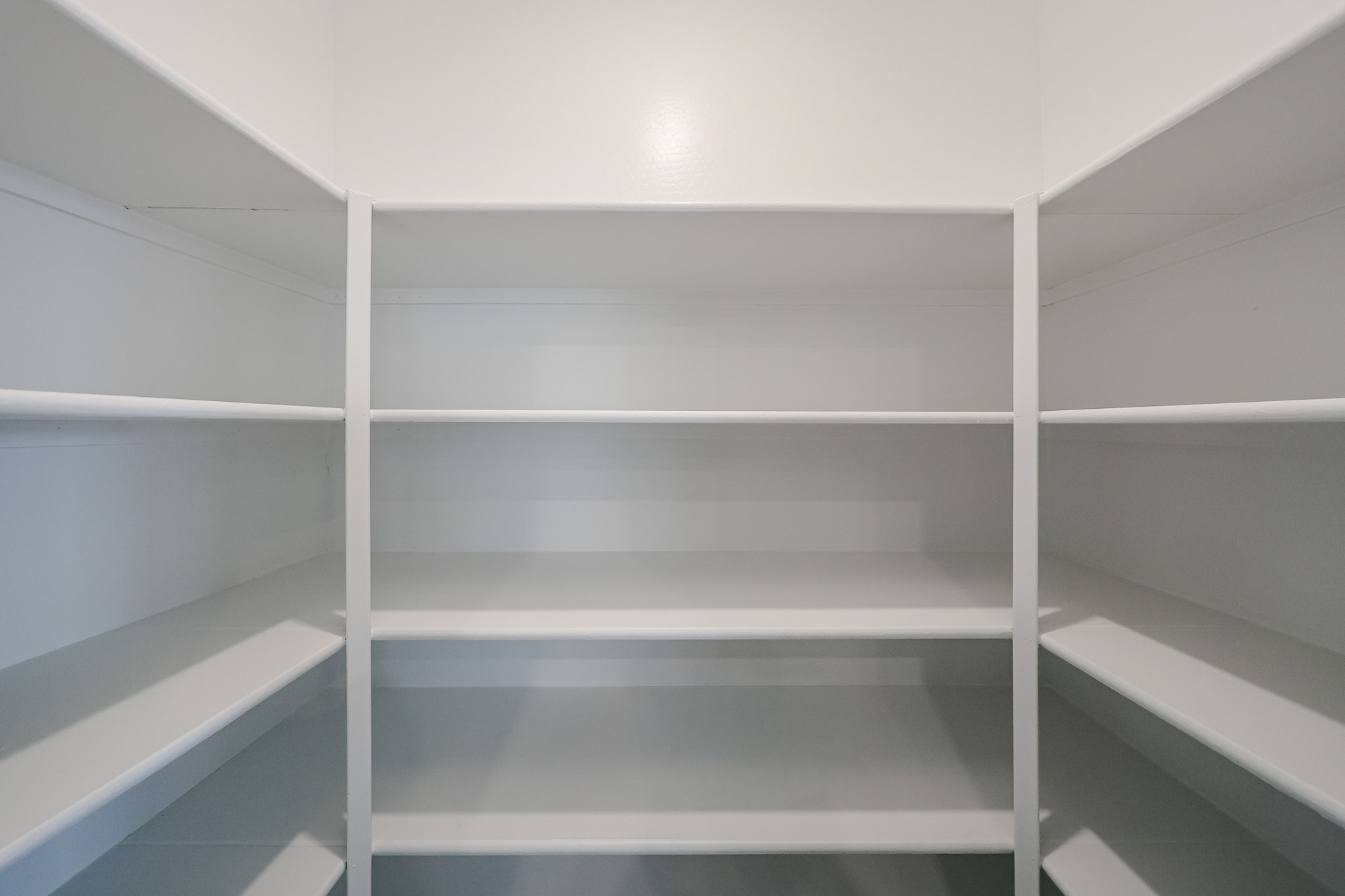 A white shelf with white shelves.