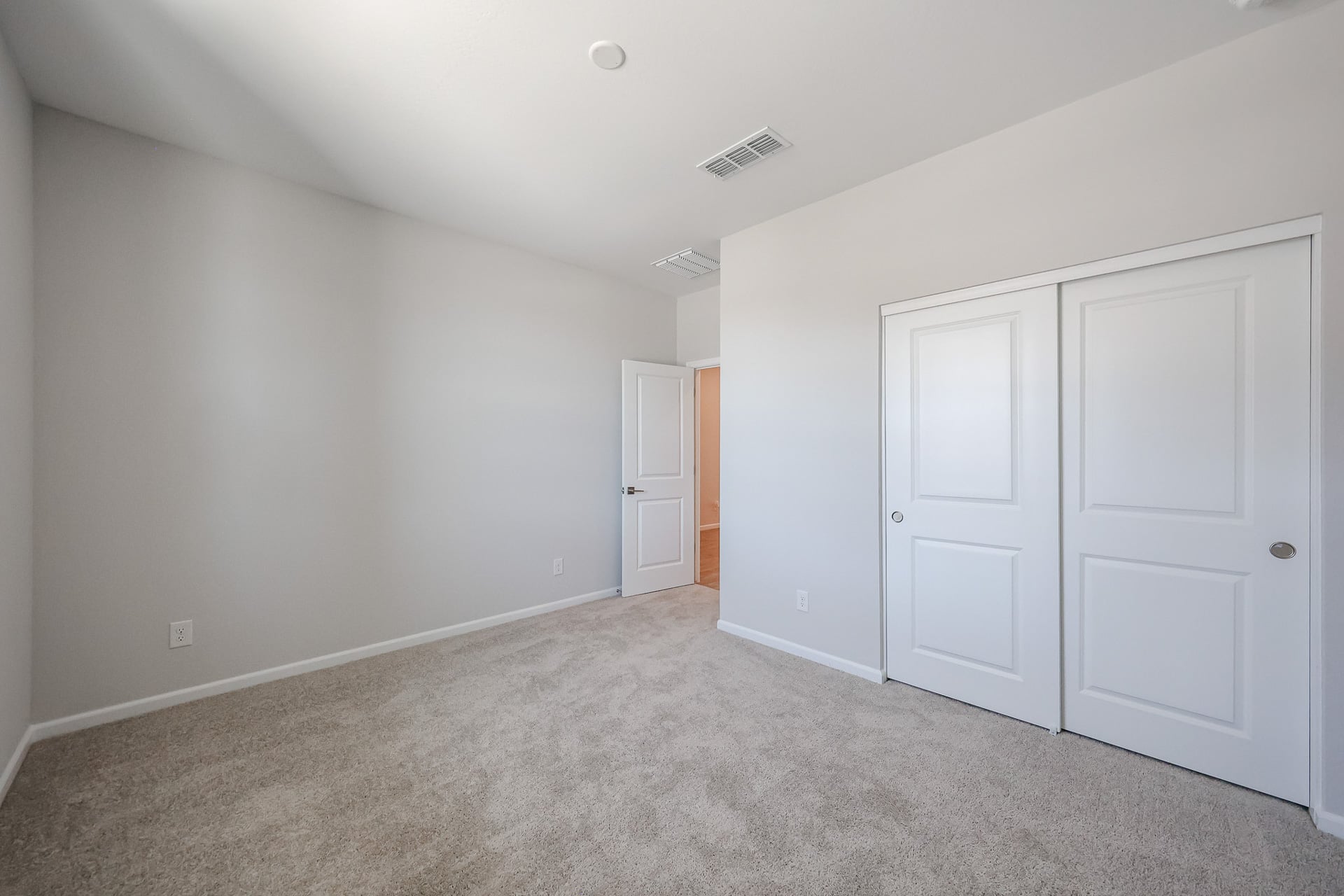 A room with white doors.