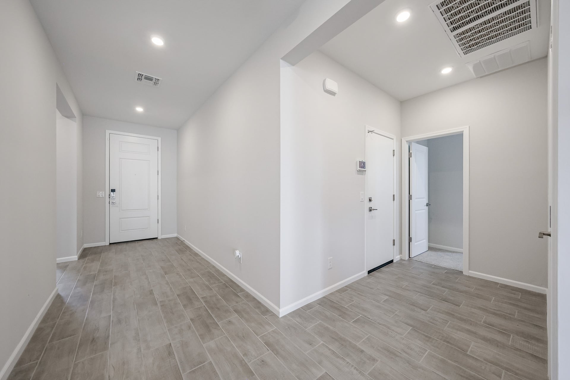 A room with white doors.