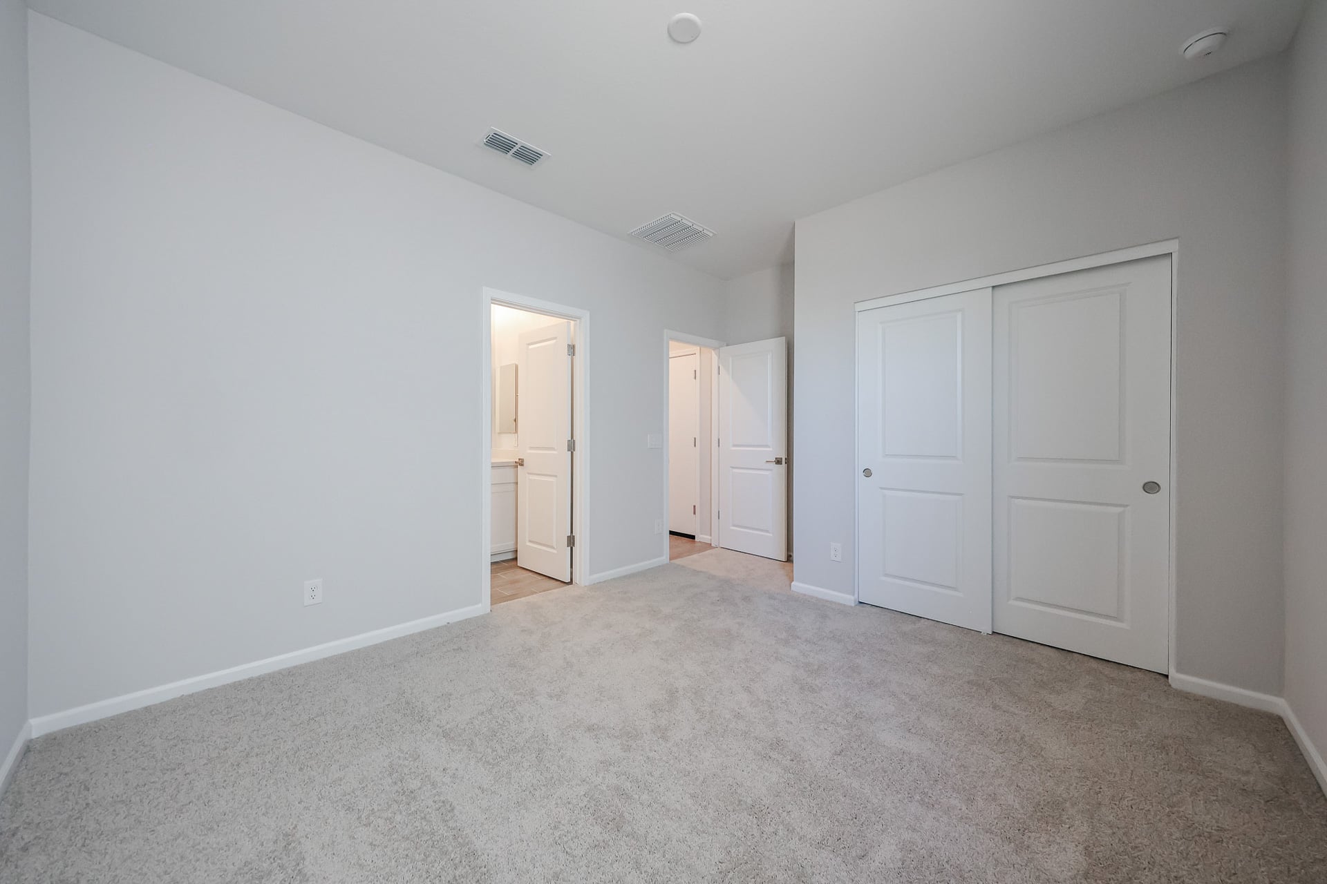 A room with white doors.