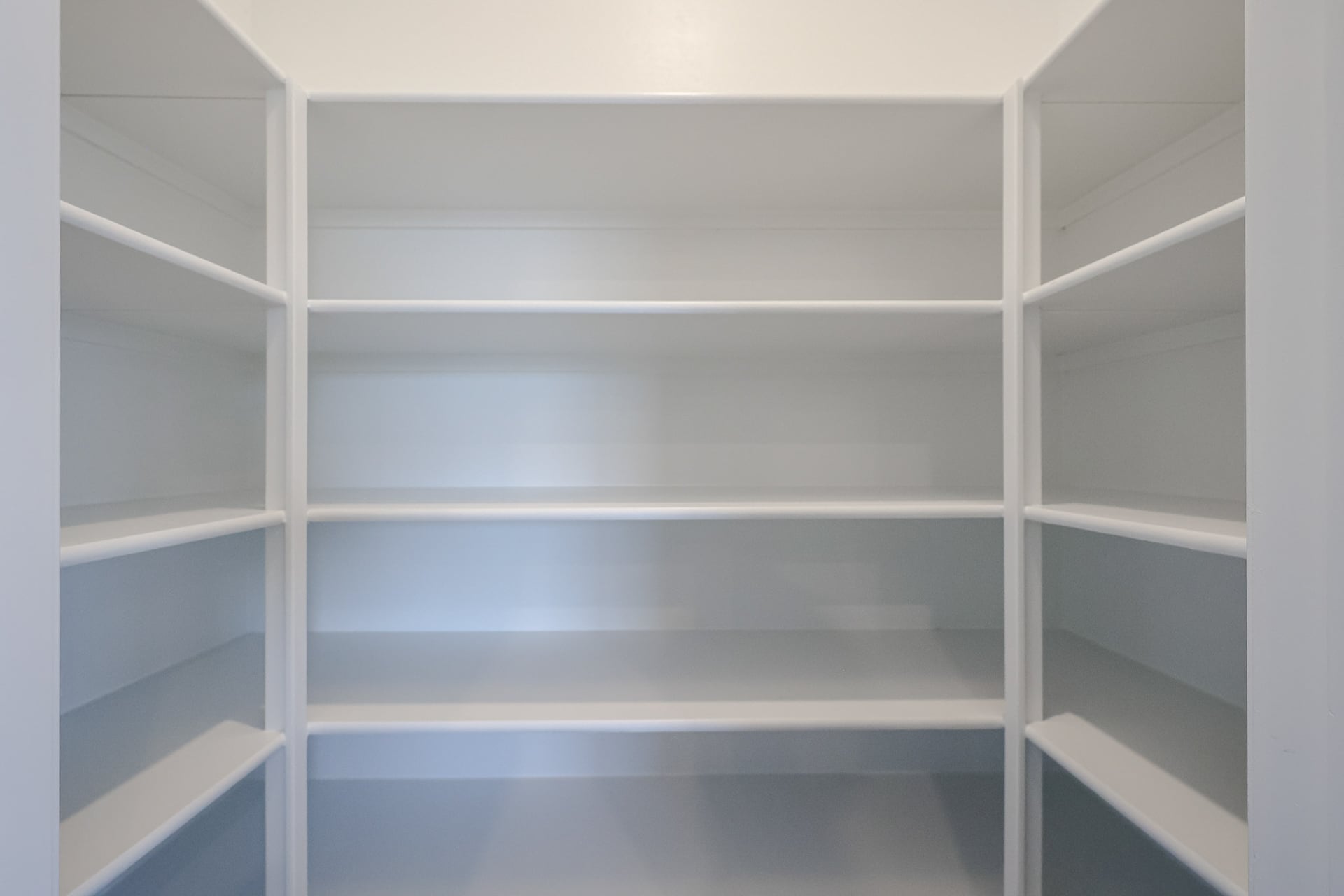 A white shelf with white shelves.