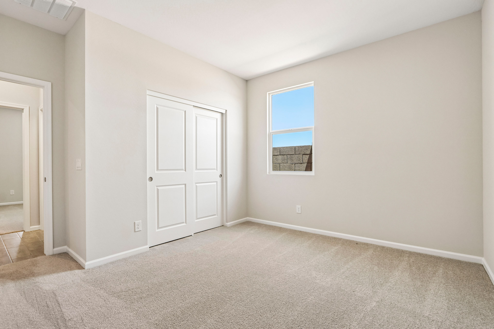 A room with white doors.