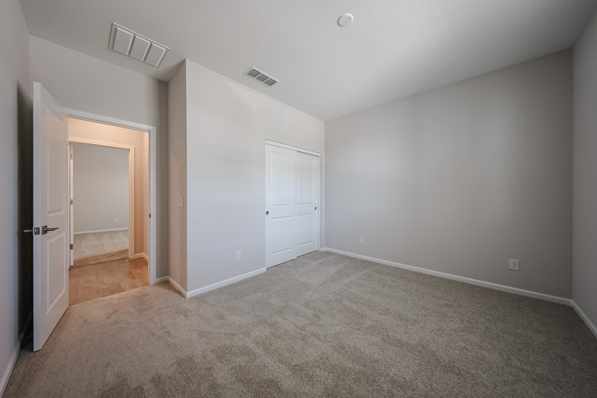 A room with white doors.