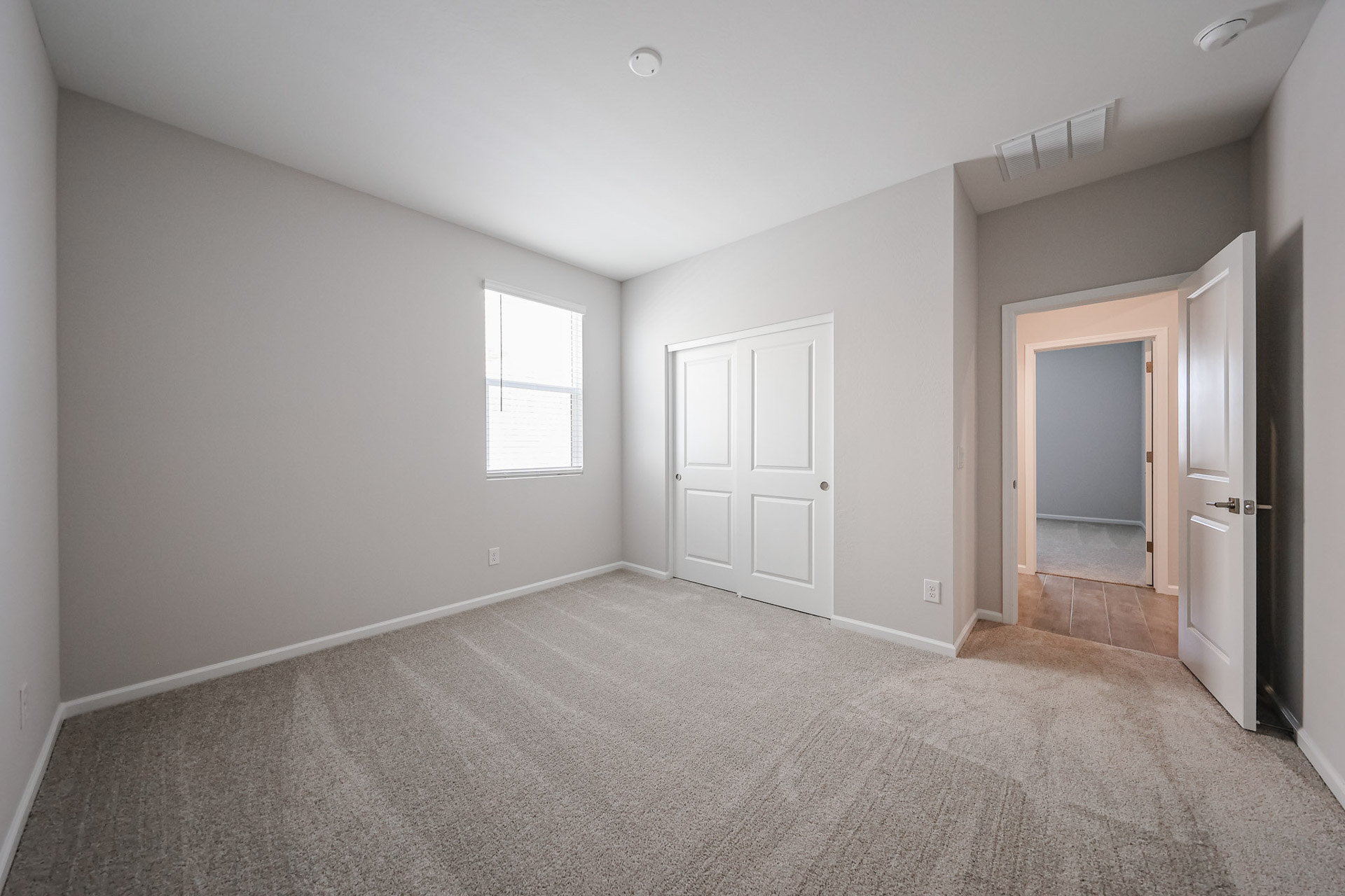 A room with white doors.