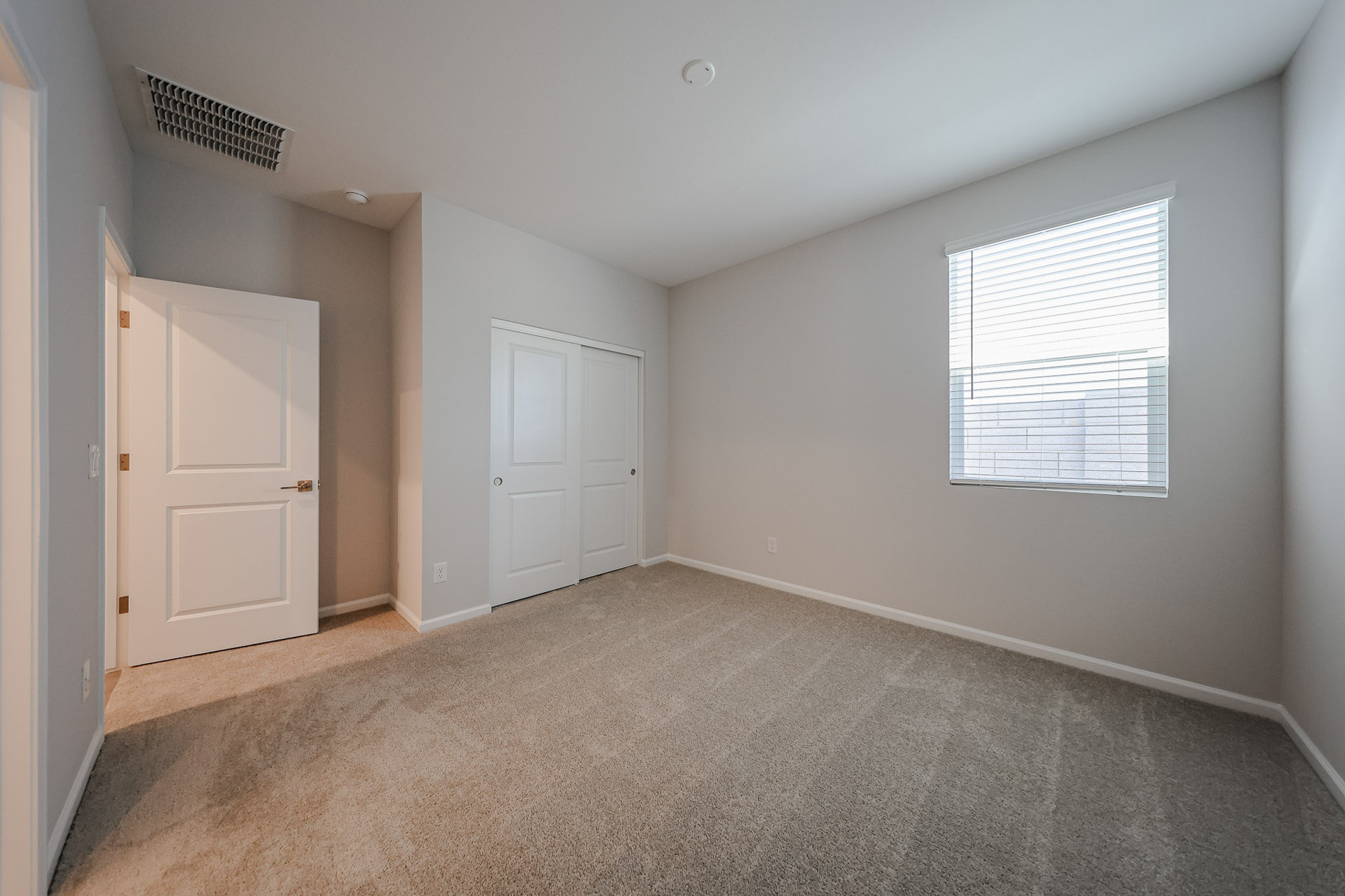 A room with white doors.