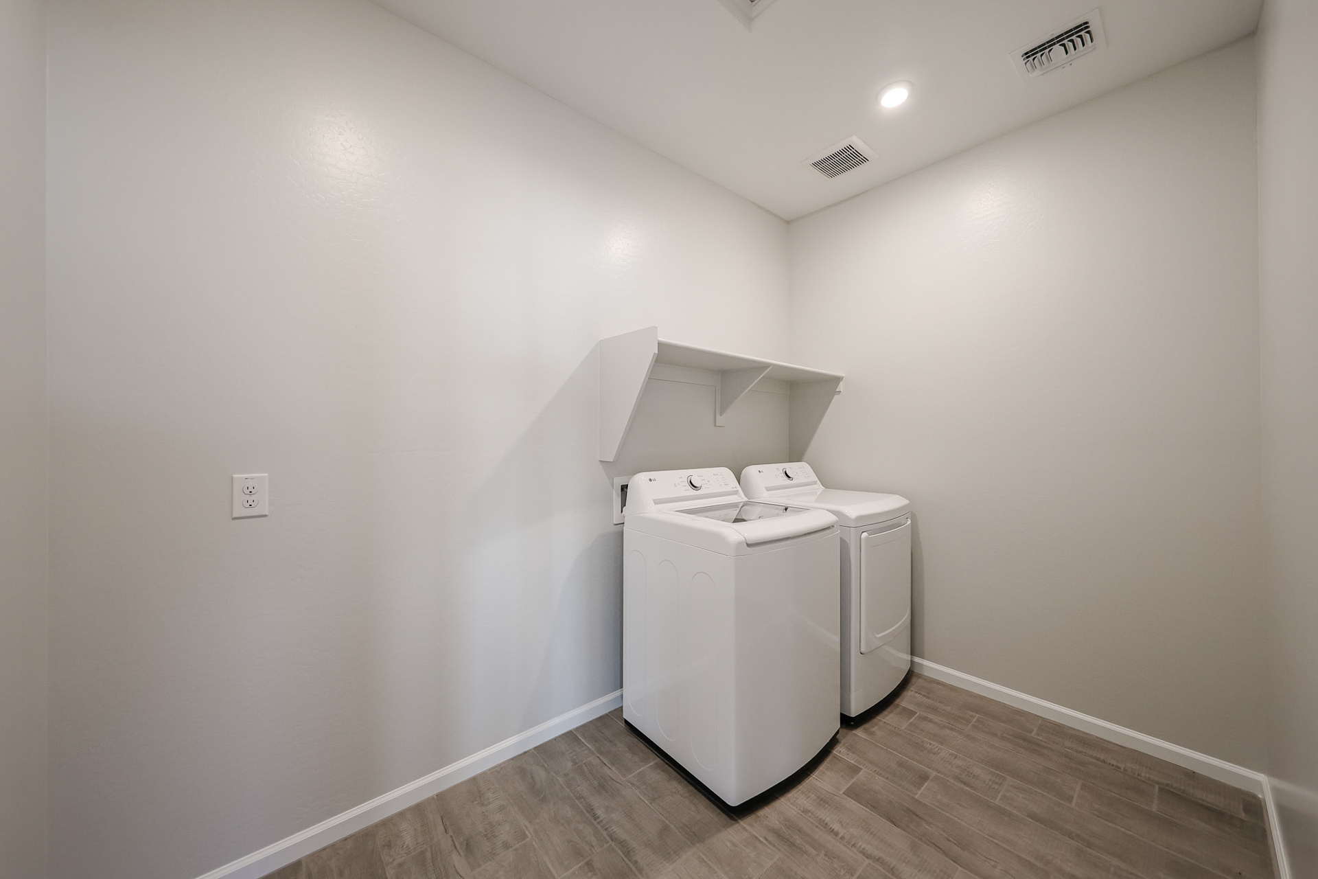 A white machine in a room.