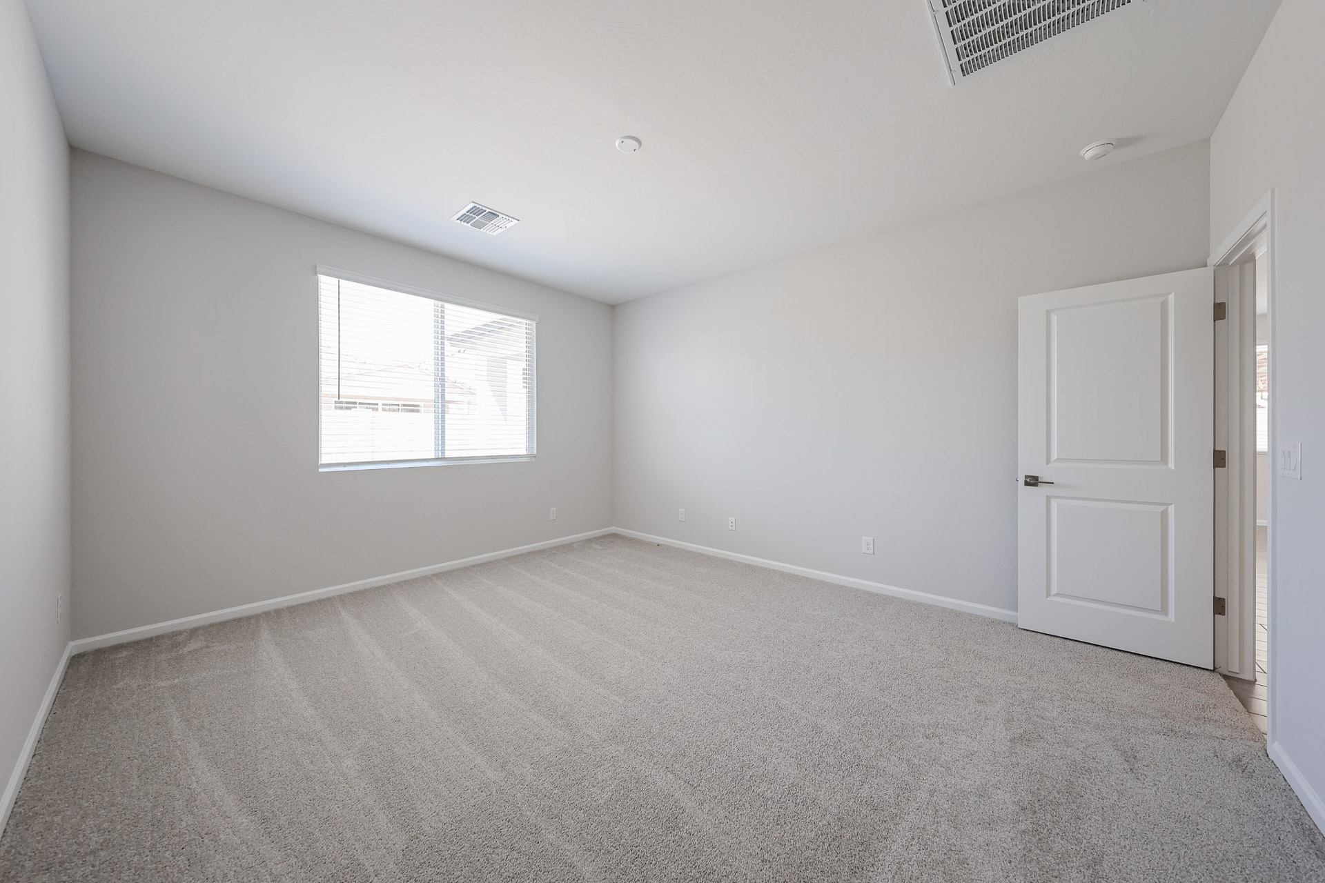 A room with white doors.
