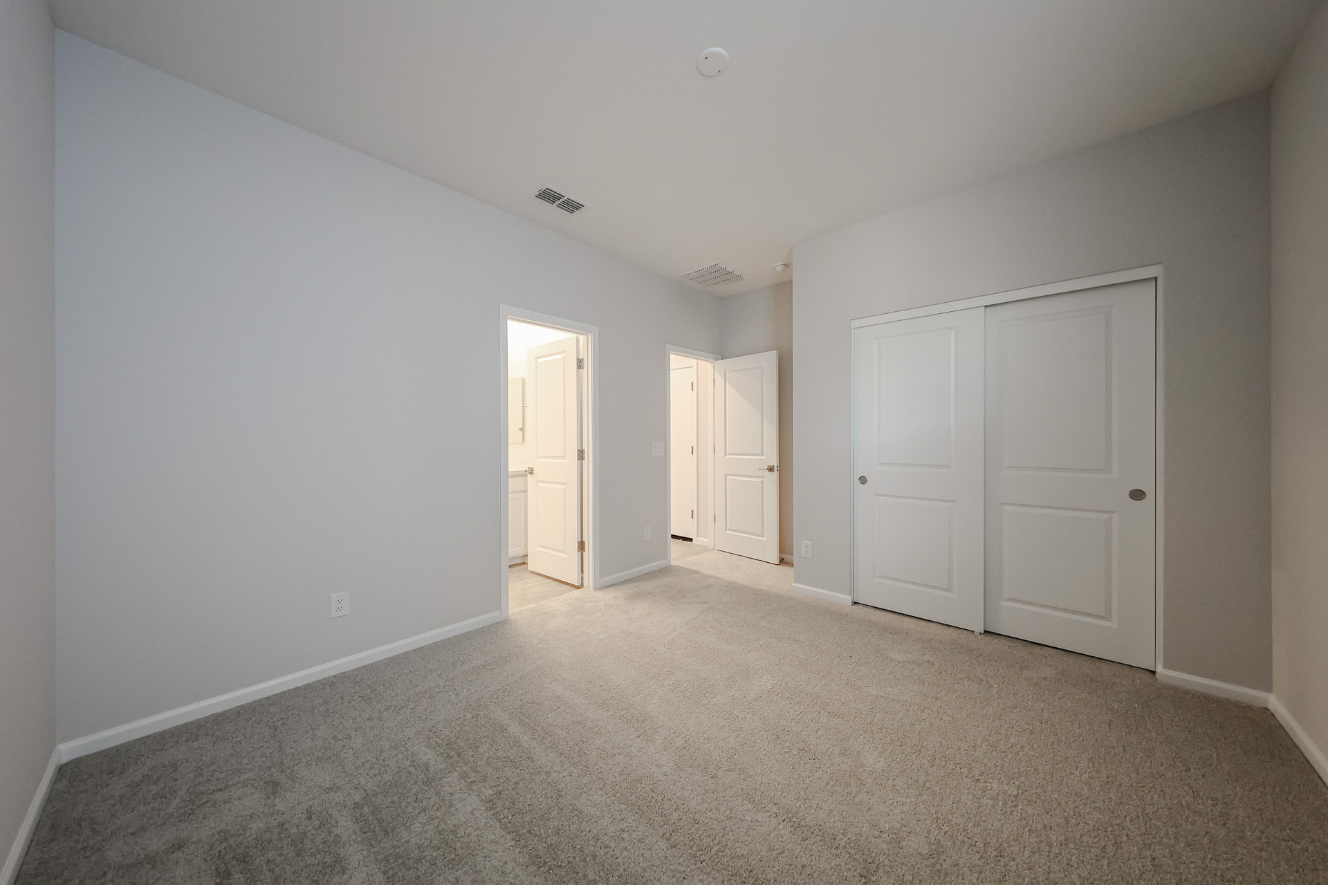 A room with white doors.