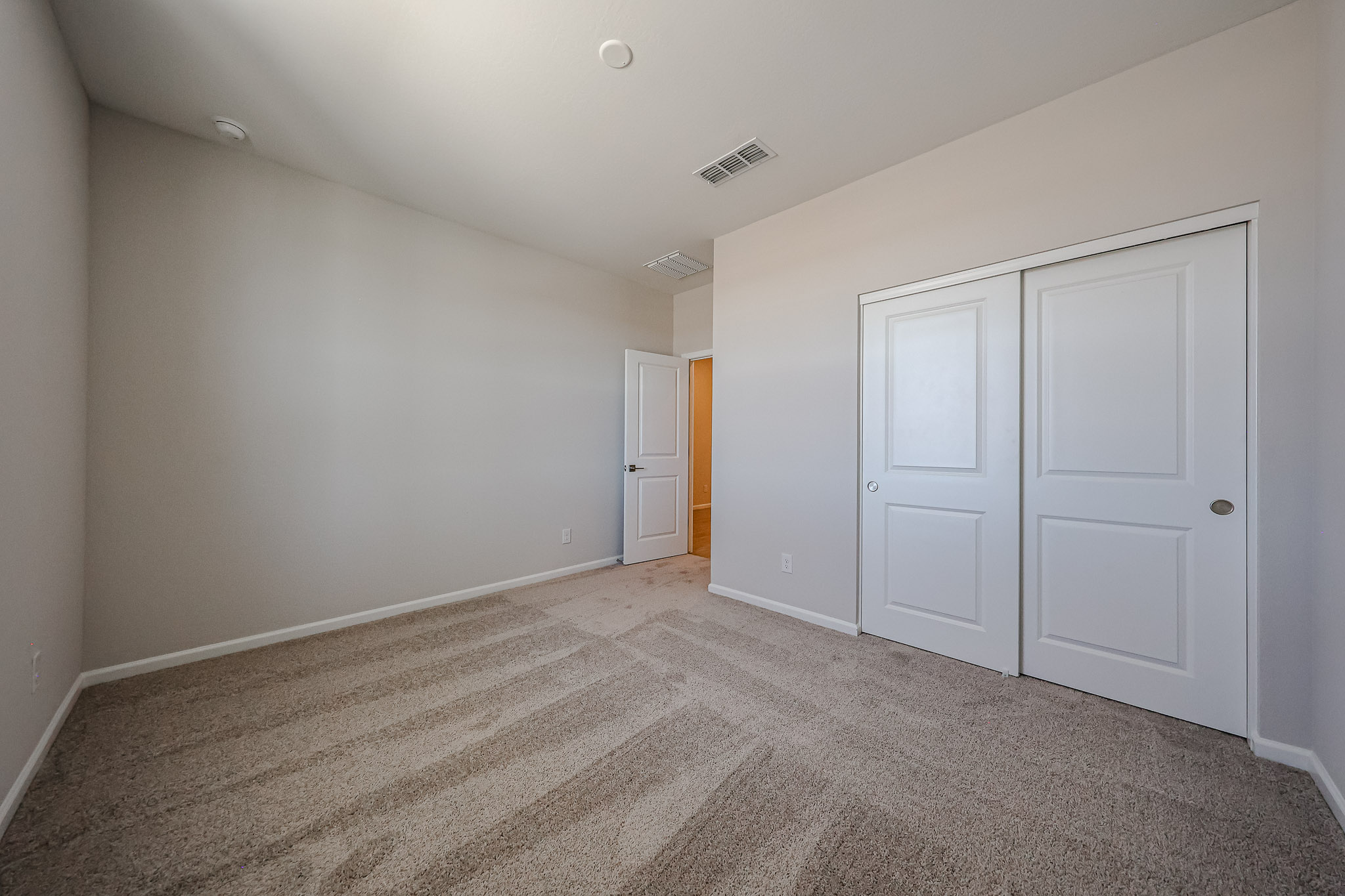 A room with white doors.