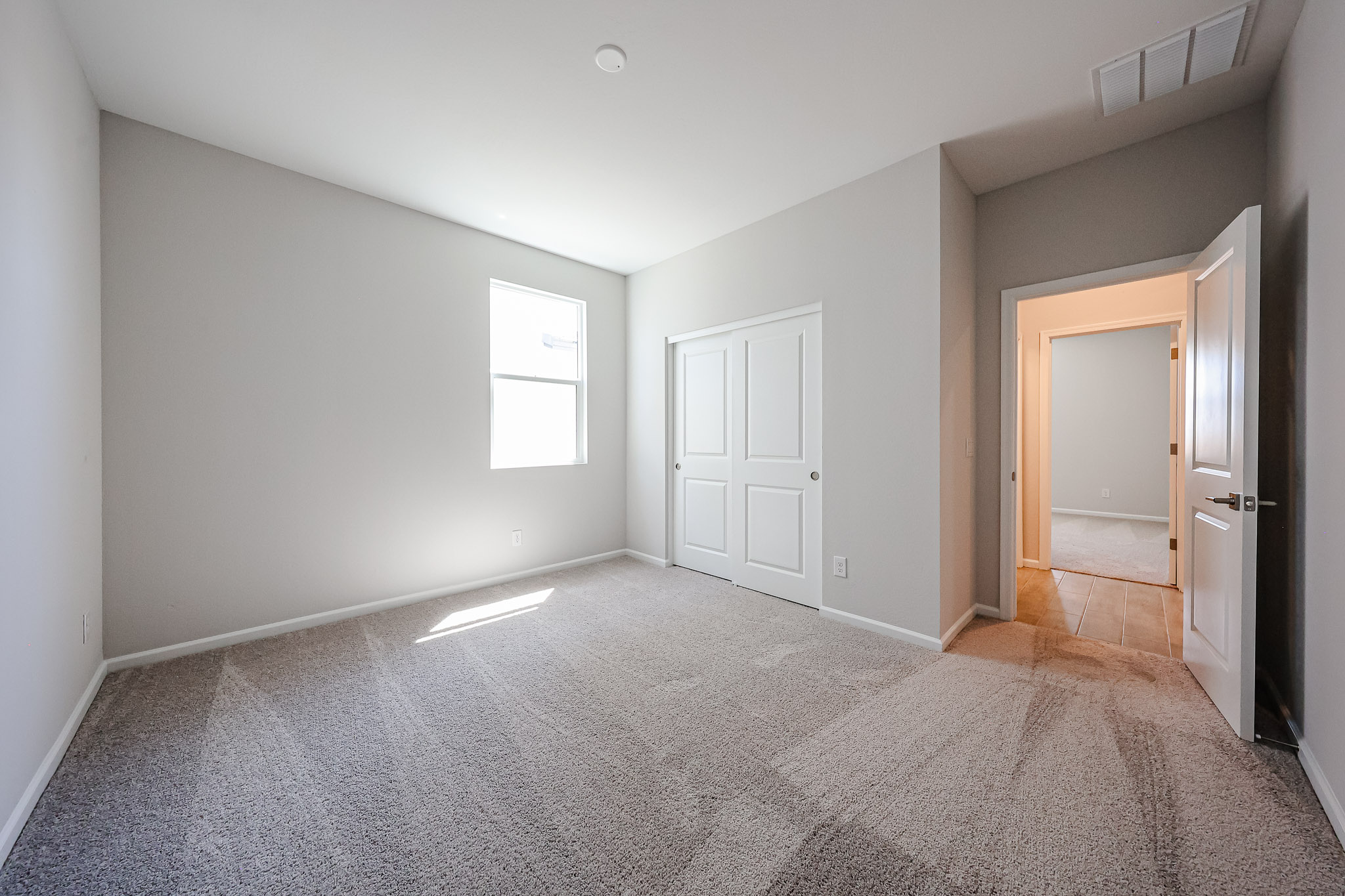 A room with white doors.
