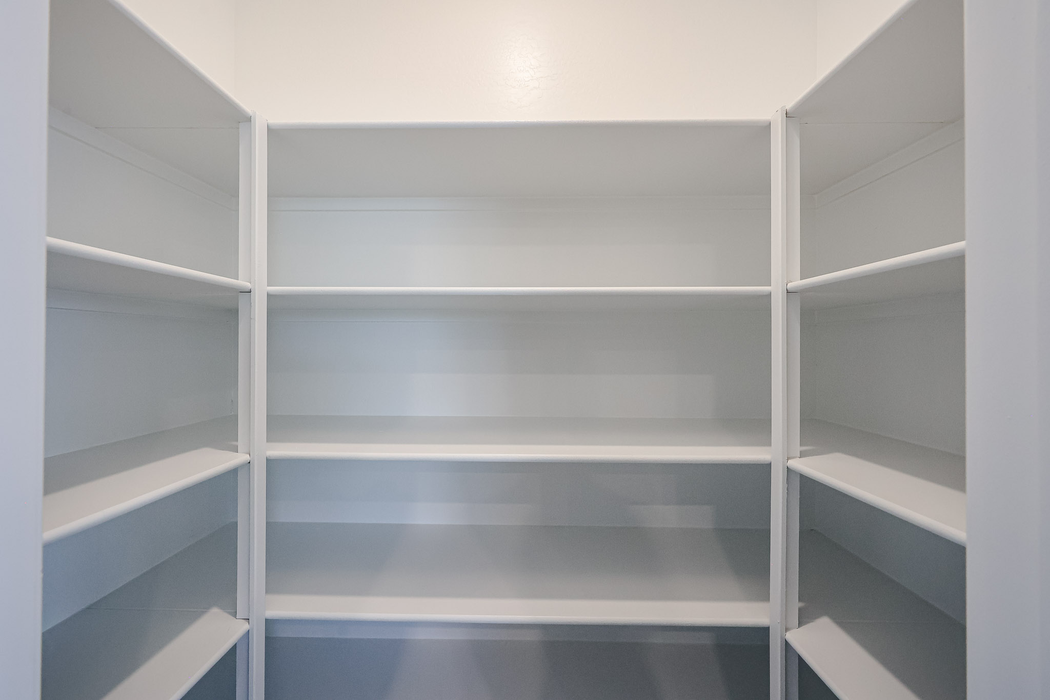 A white shelf with white shelves.