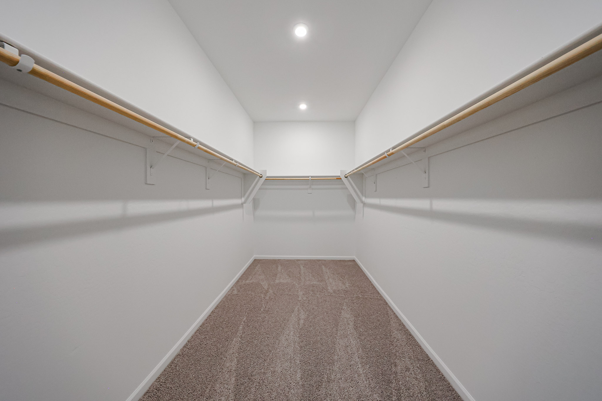 A hallway with white walls.