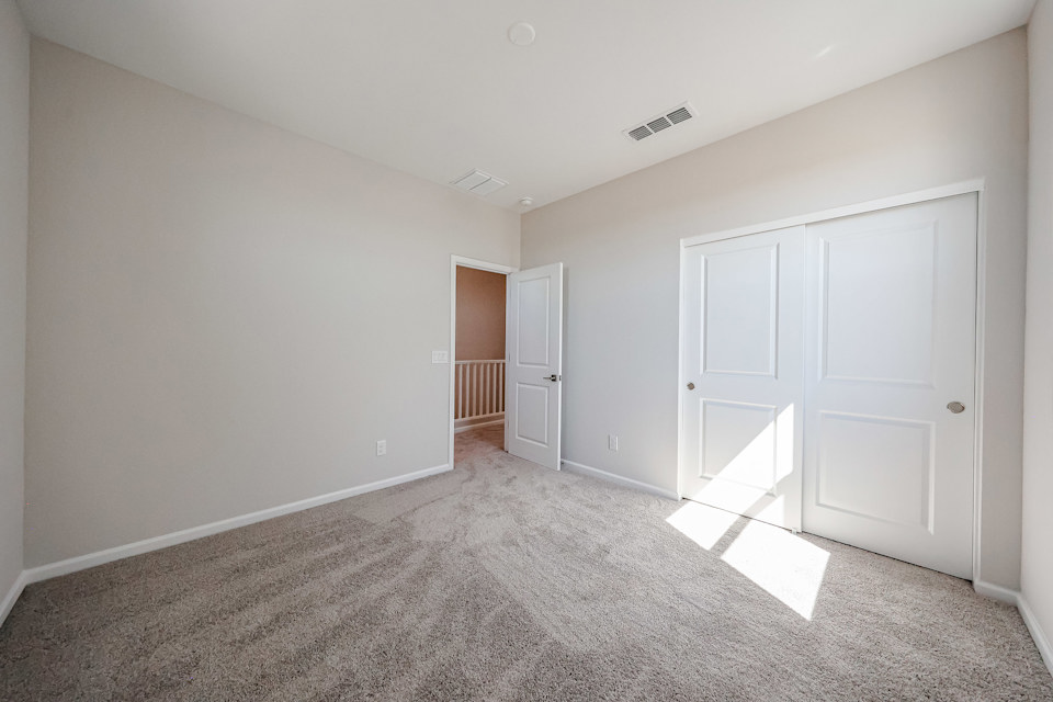 A room with white doors.