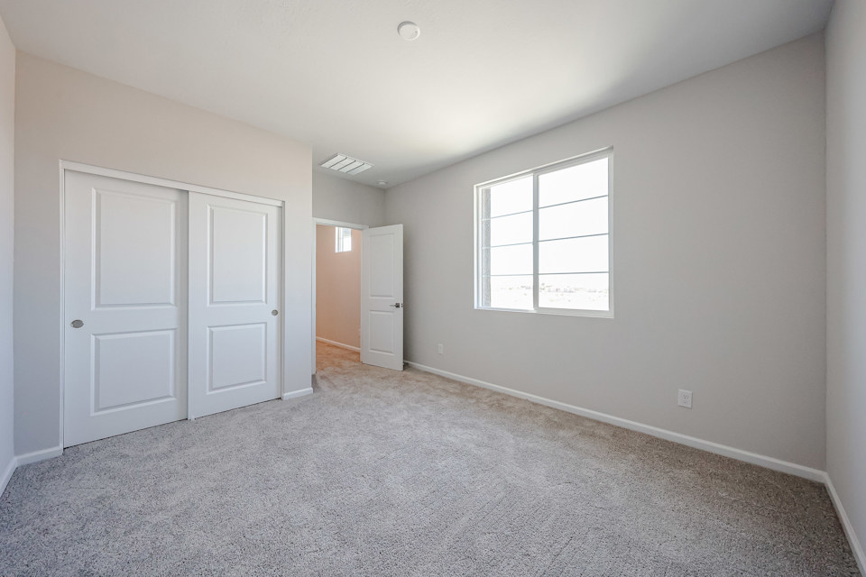 A room with white doors.