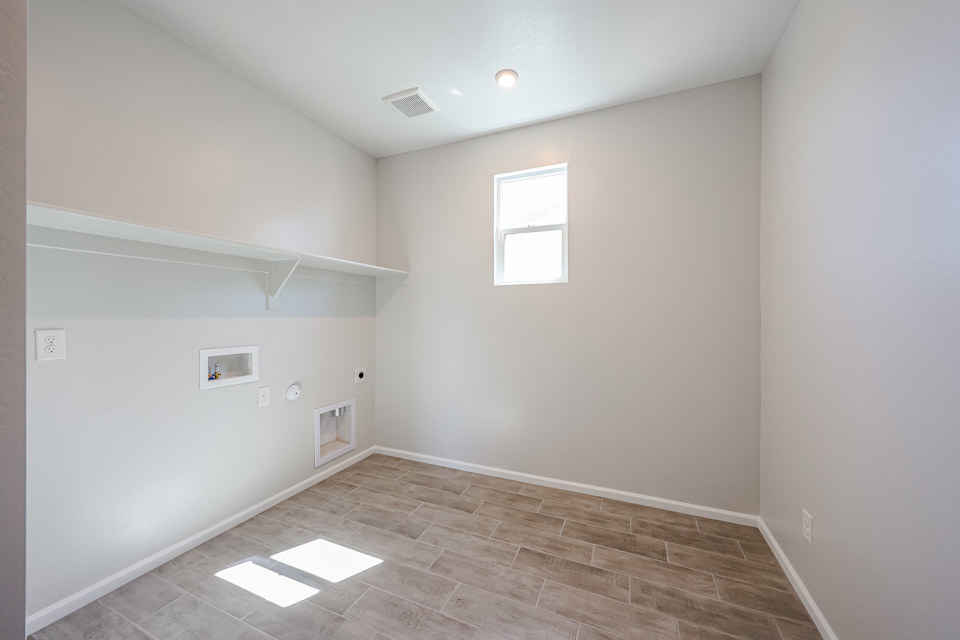 A room with a tile floor and a tile floor.