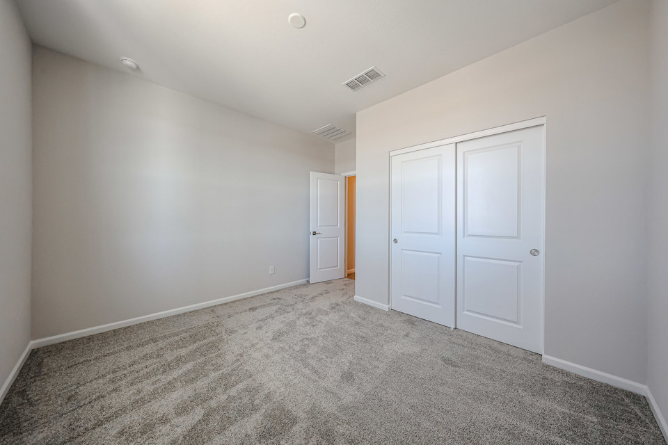 A room with white doors.