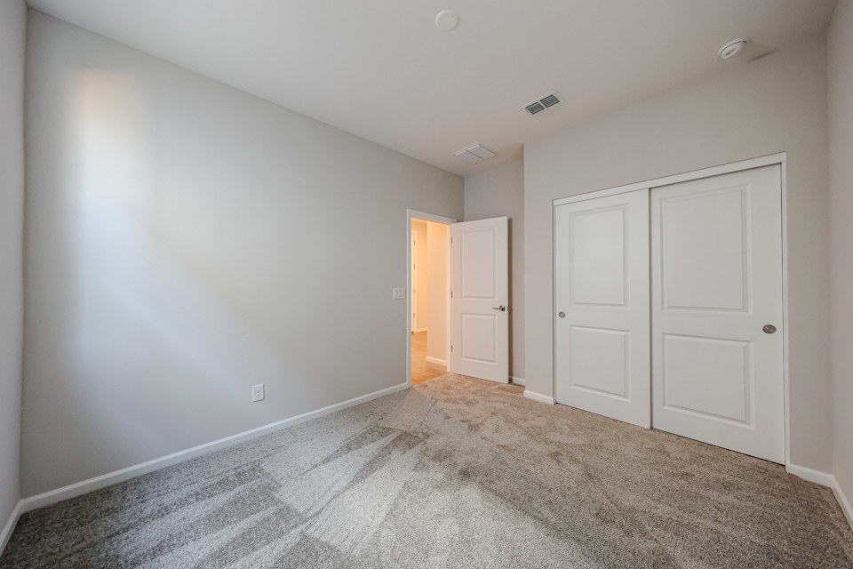A room with white doors.