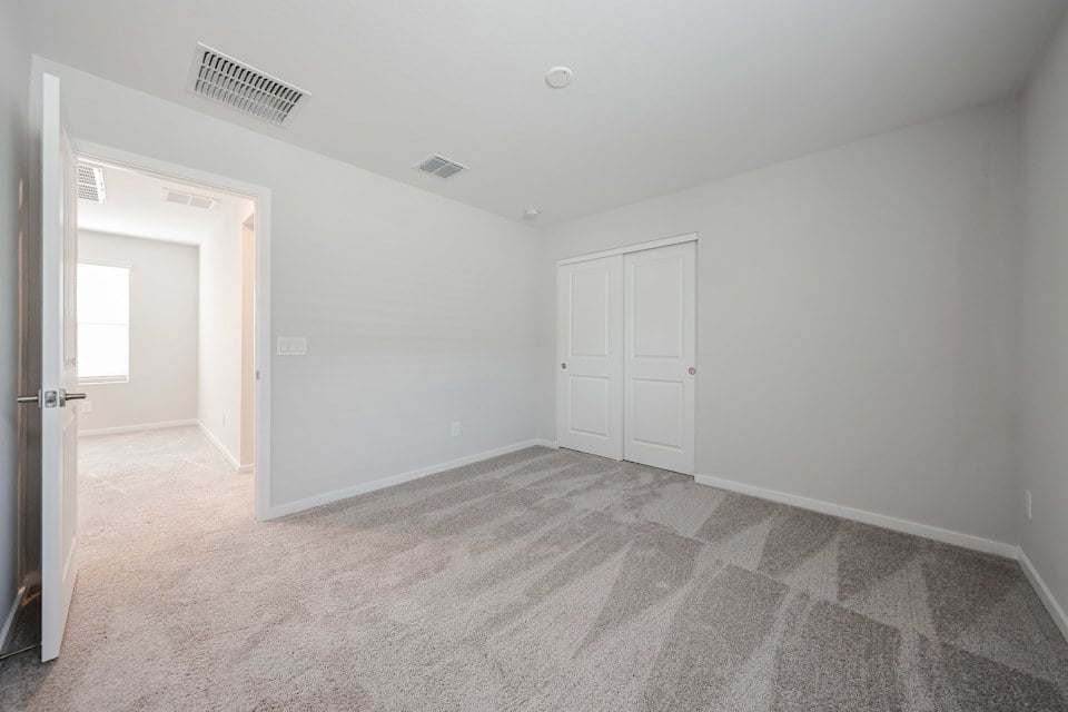 A room with white doors.
