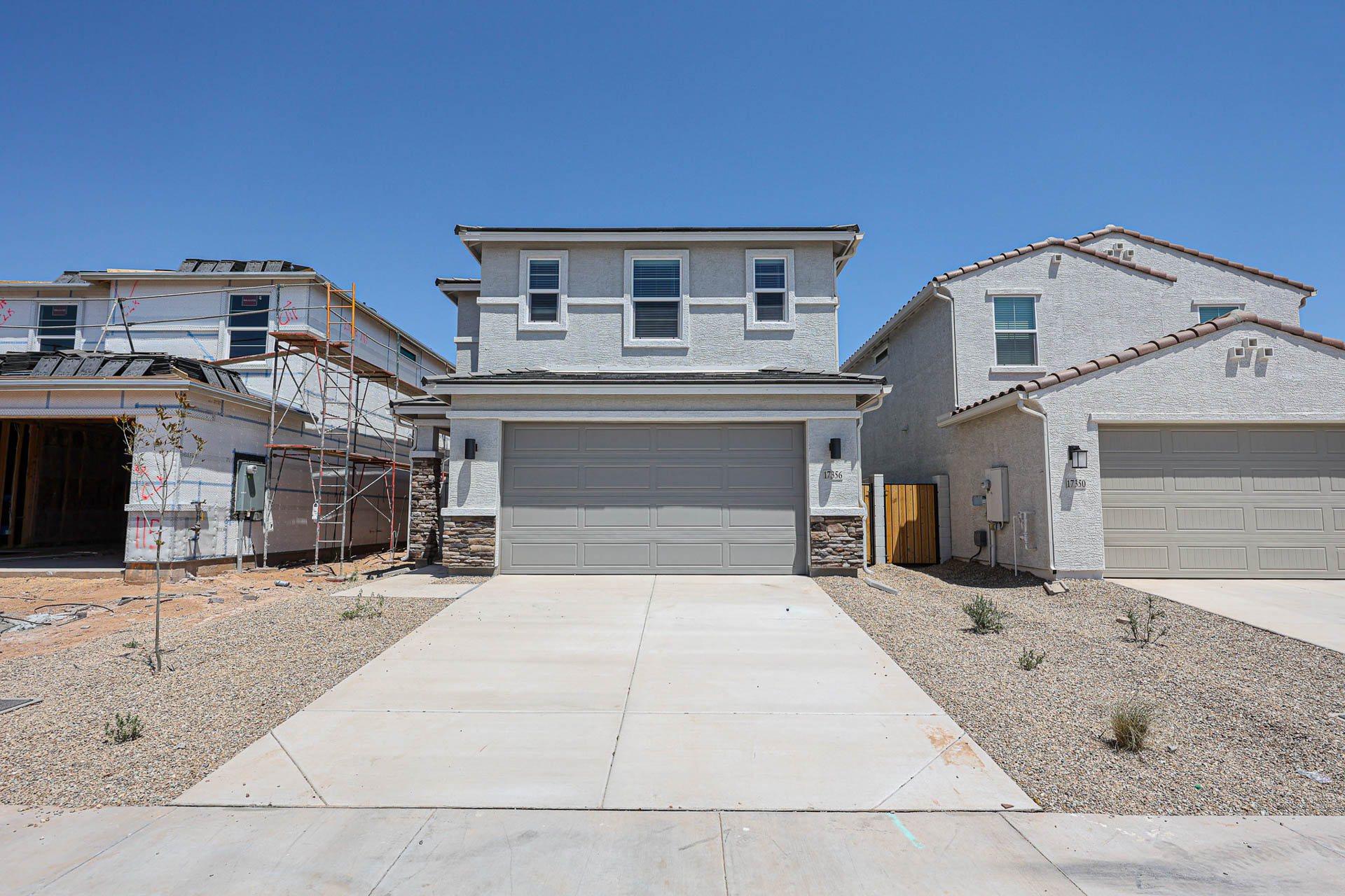 A group of buildings with garages.