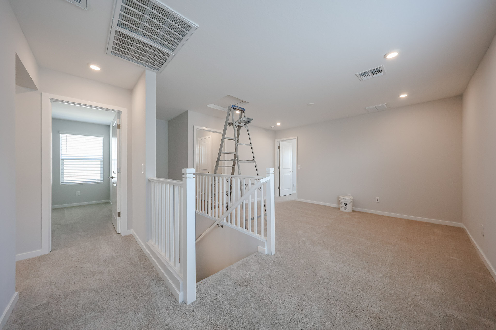 A white staircase in a house.