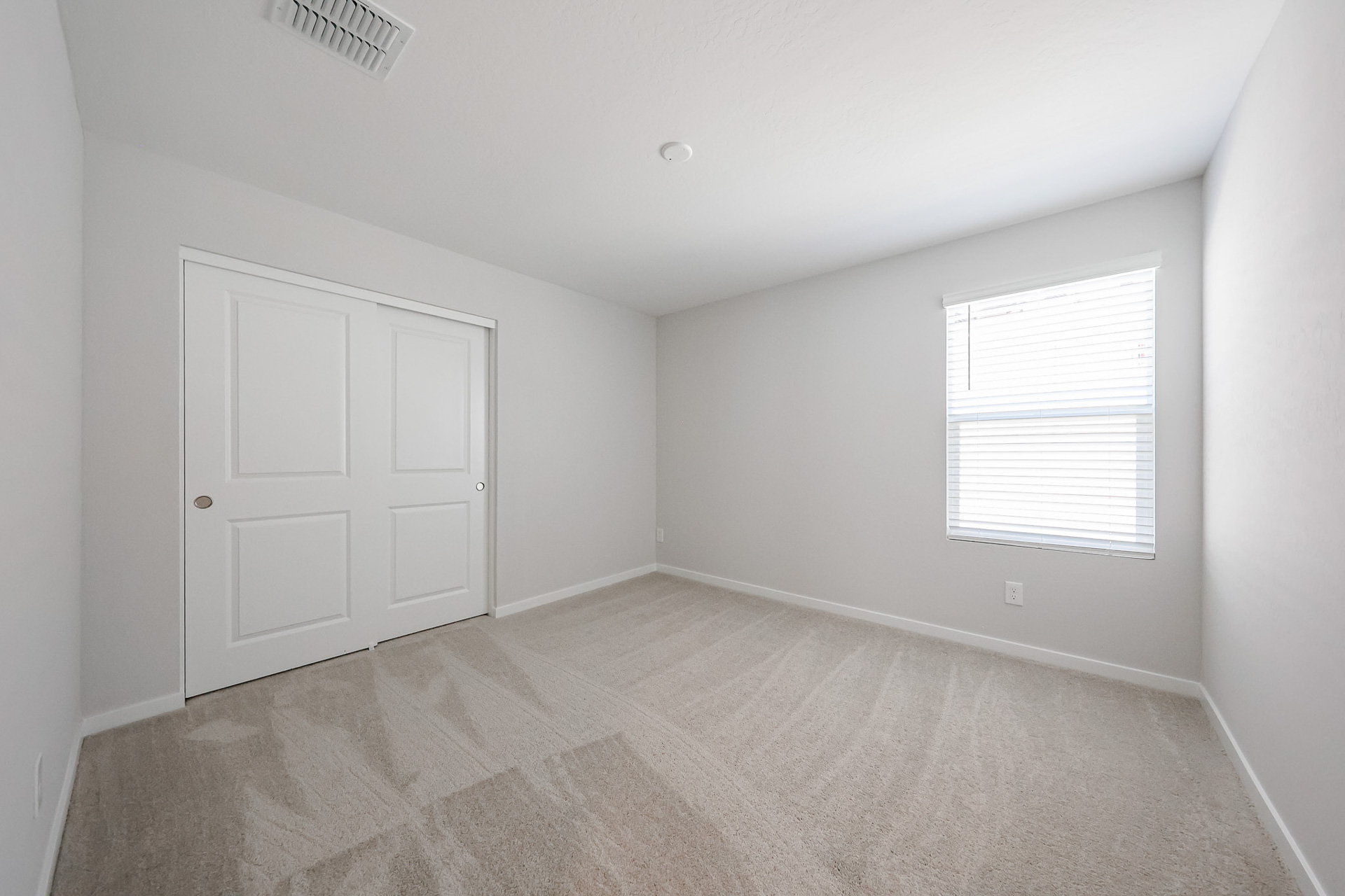 A room with white doors.