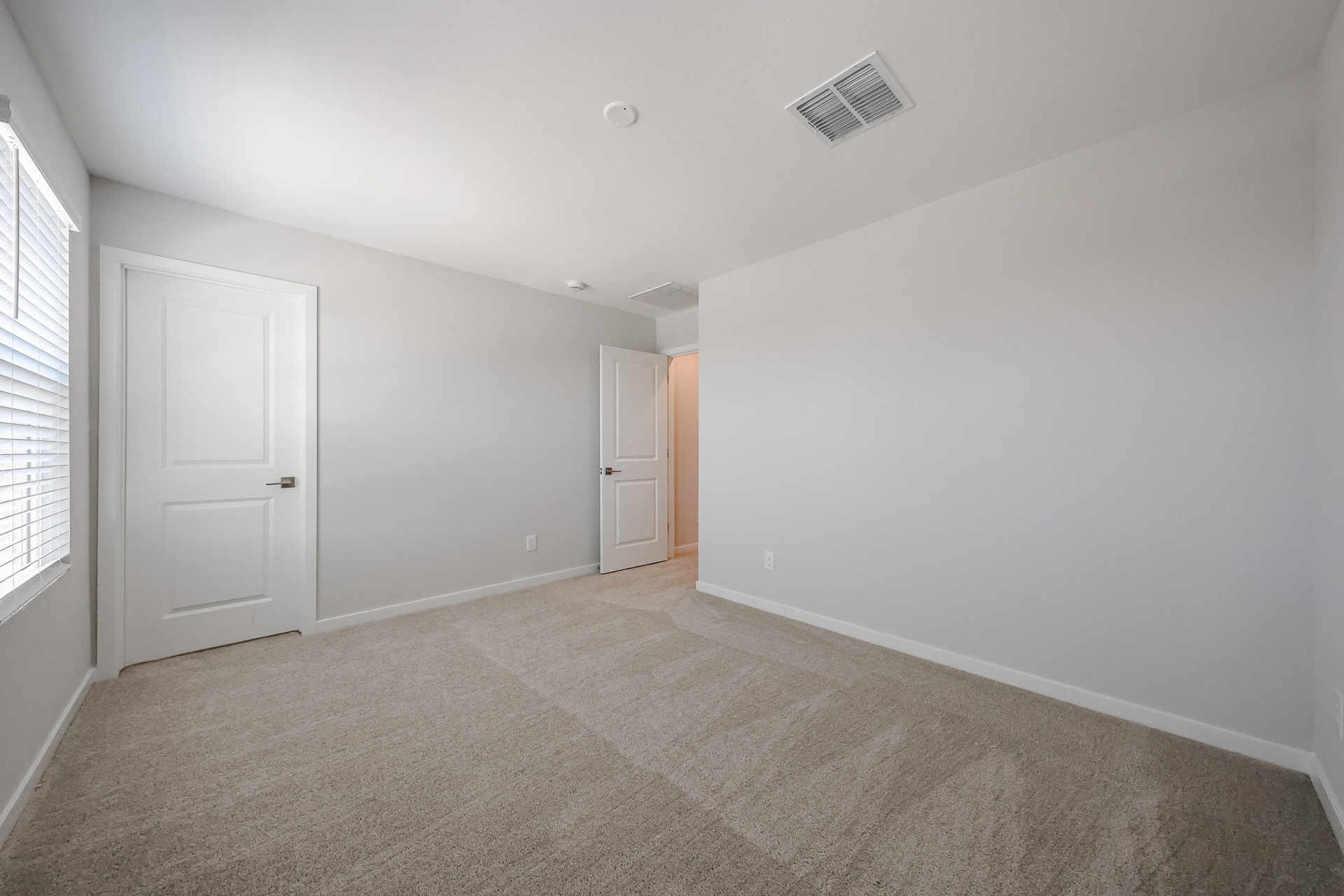 A room with white doors.