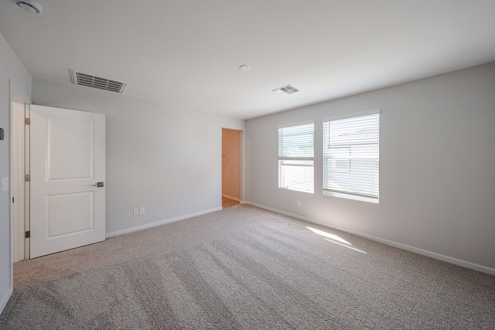 A room with white doors.