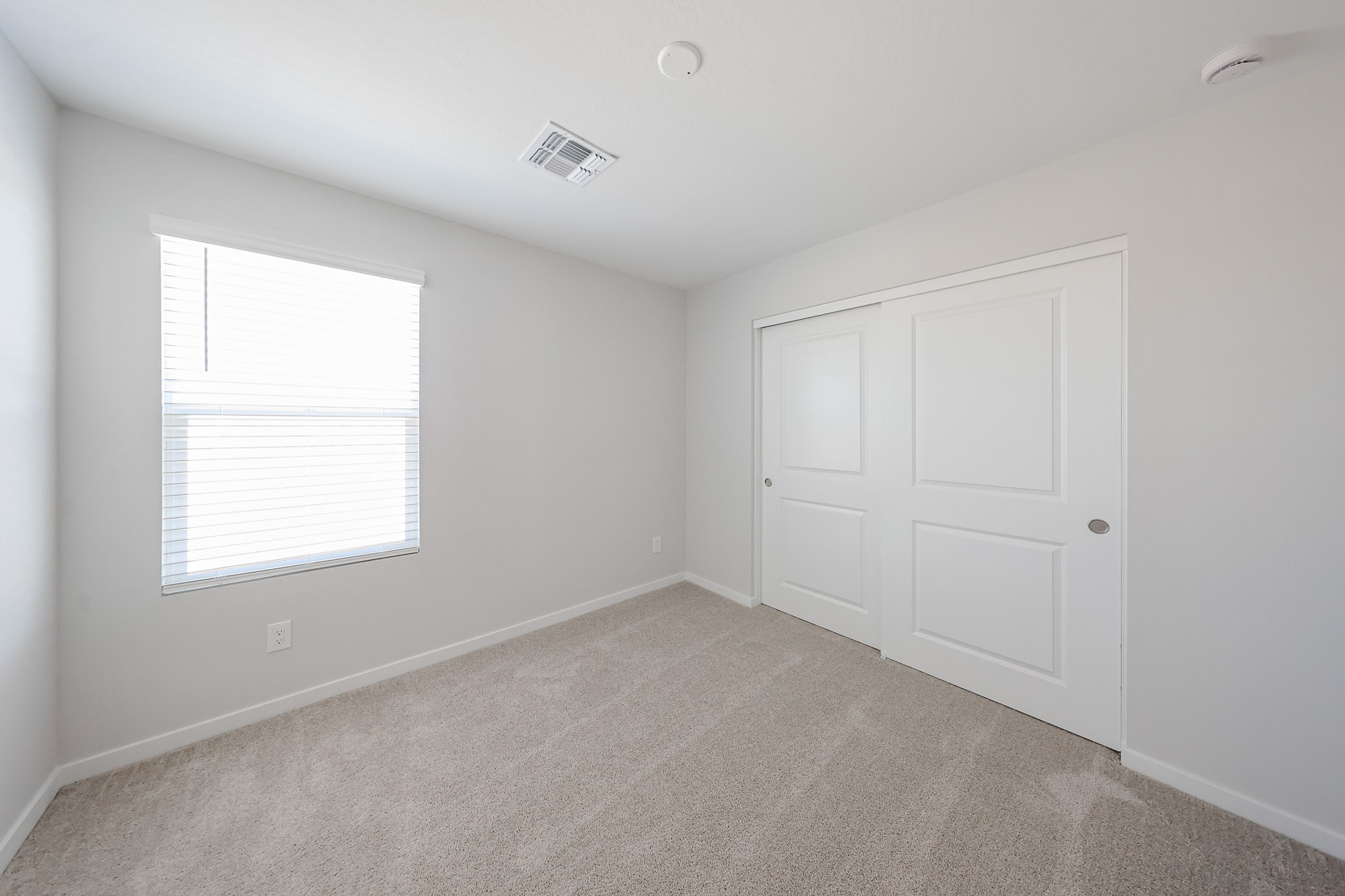 A room with white doors.