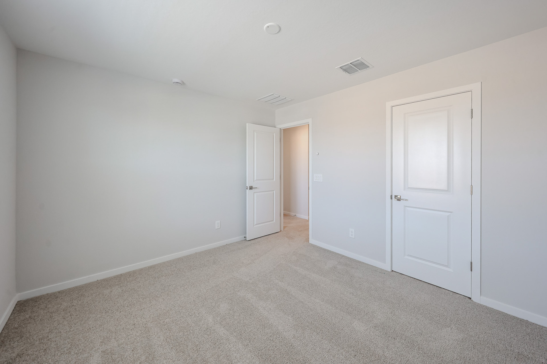 A room with white doors.