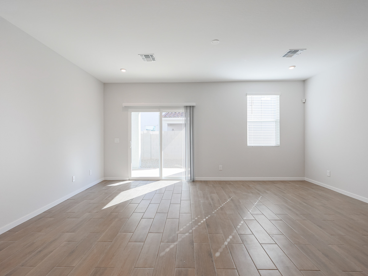 A room with a wood floor and a wood floor.