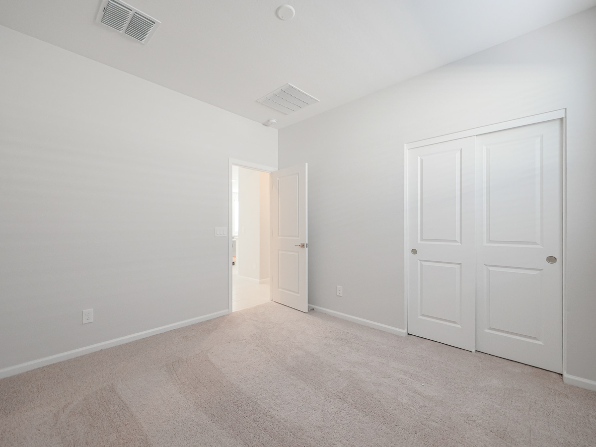 A room with white doors.