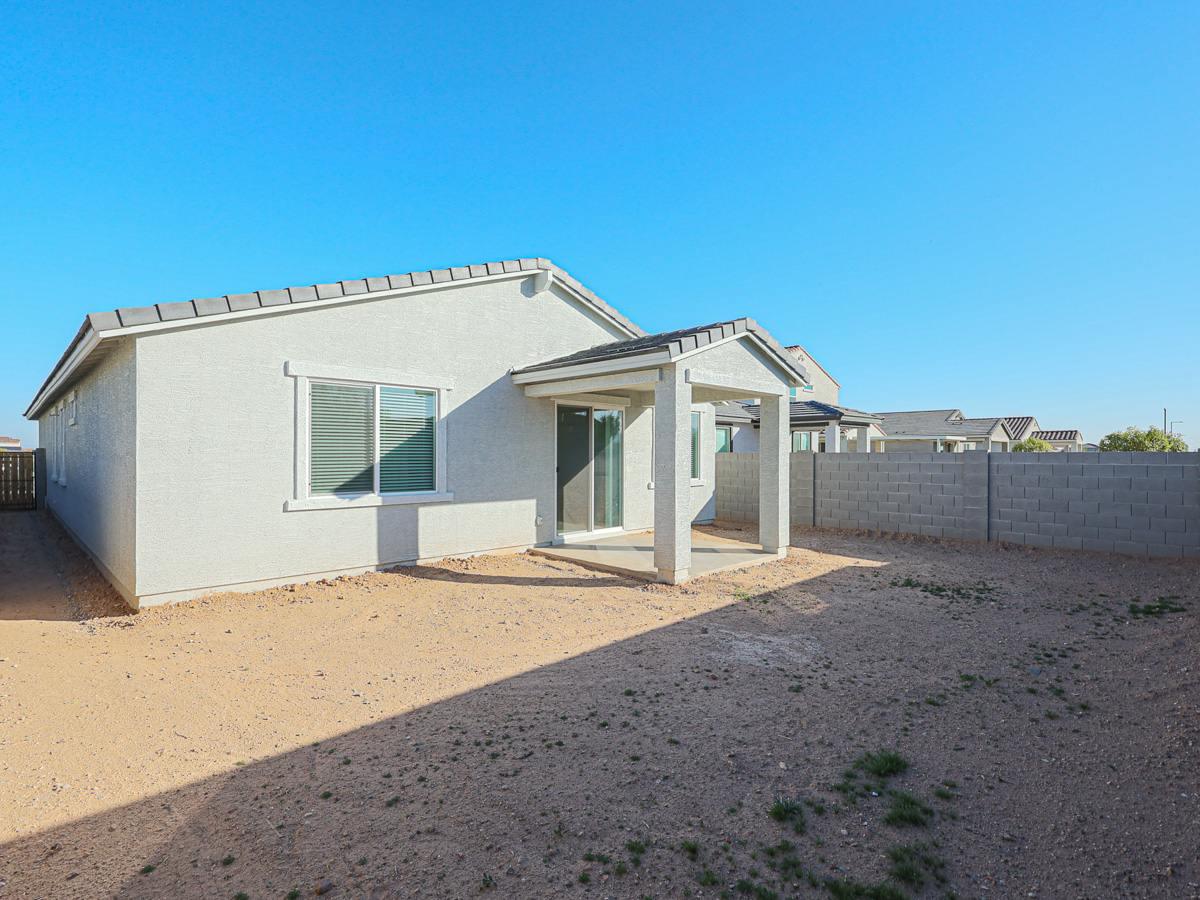 A house with a fence around it.