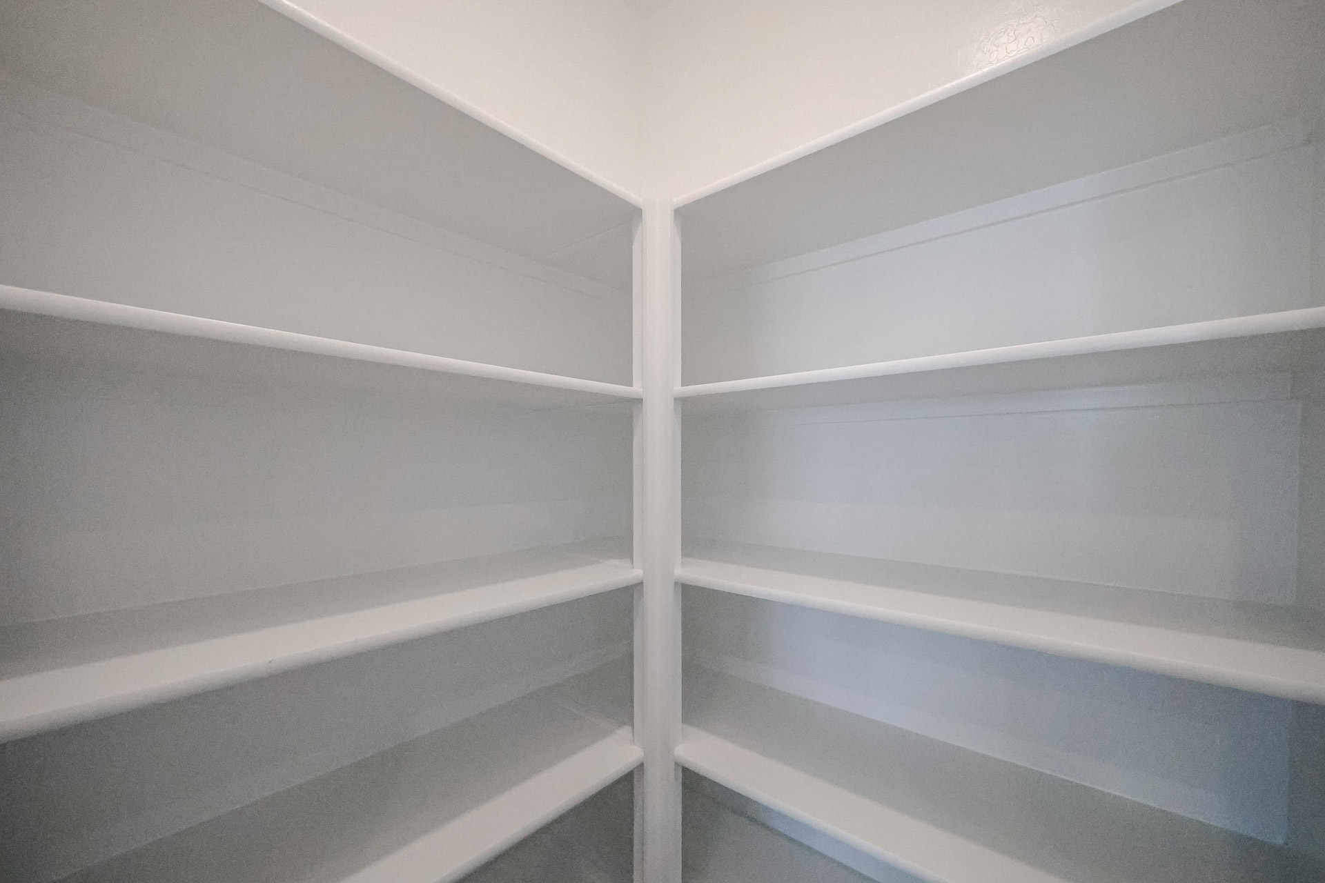 A white shelf with white shelves.